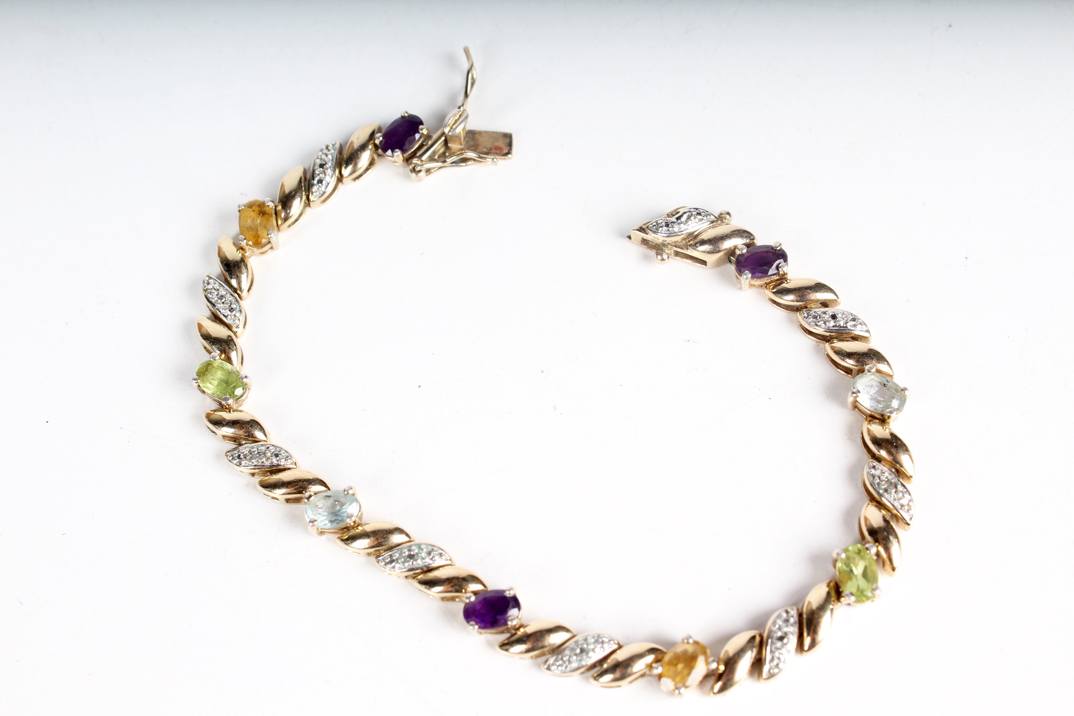 A Multi-Gemstone Tennis Bracelet