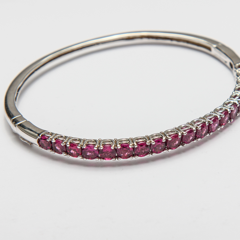 Pair of Silver Bracelets with Purple Gemstones