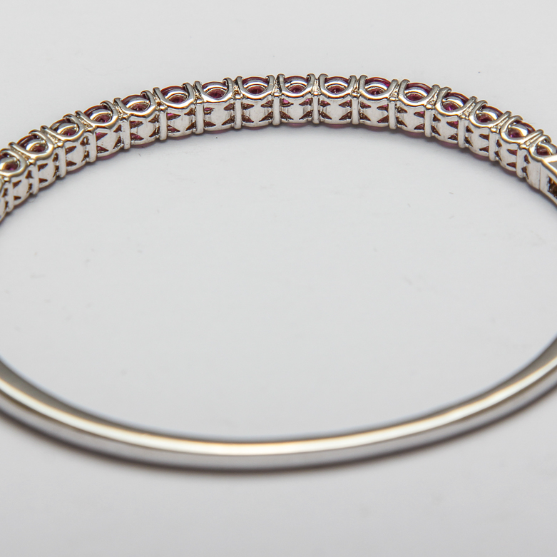 Pair of Silver Bracelets with Purple Gemstones