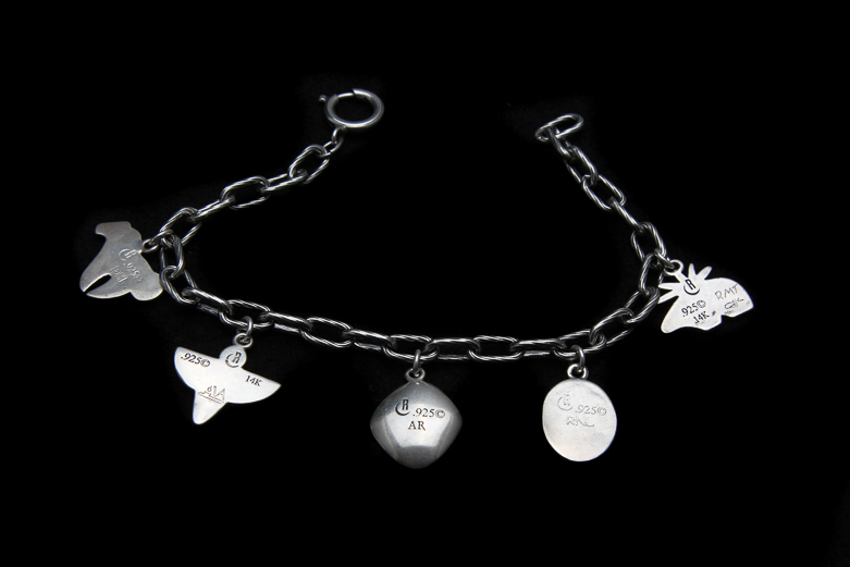 Trio of Sterling Silver Pins and Charm Bracelet