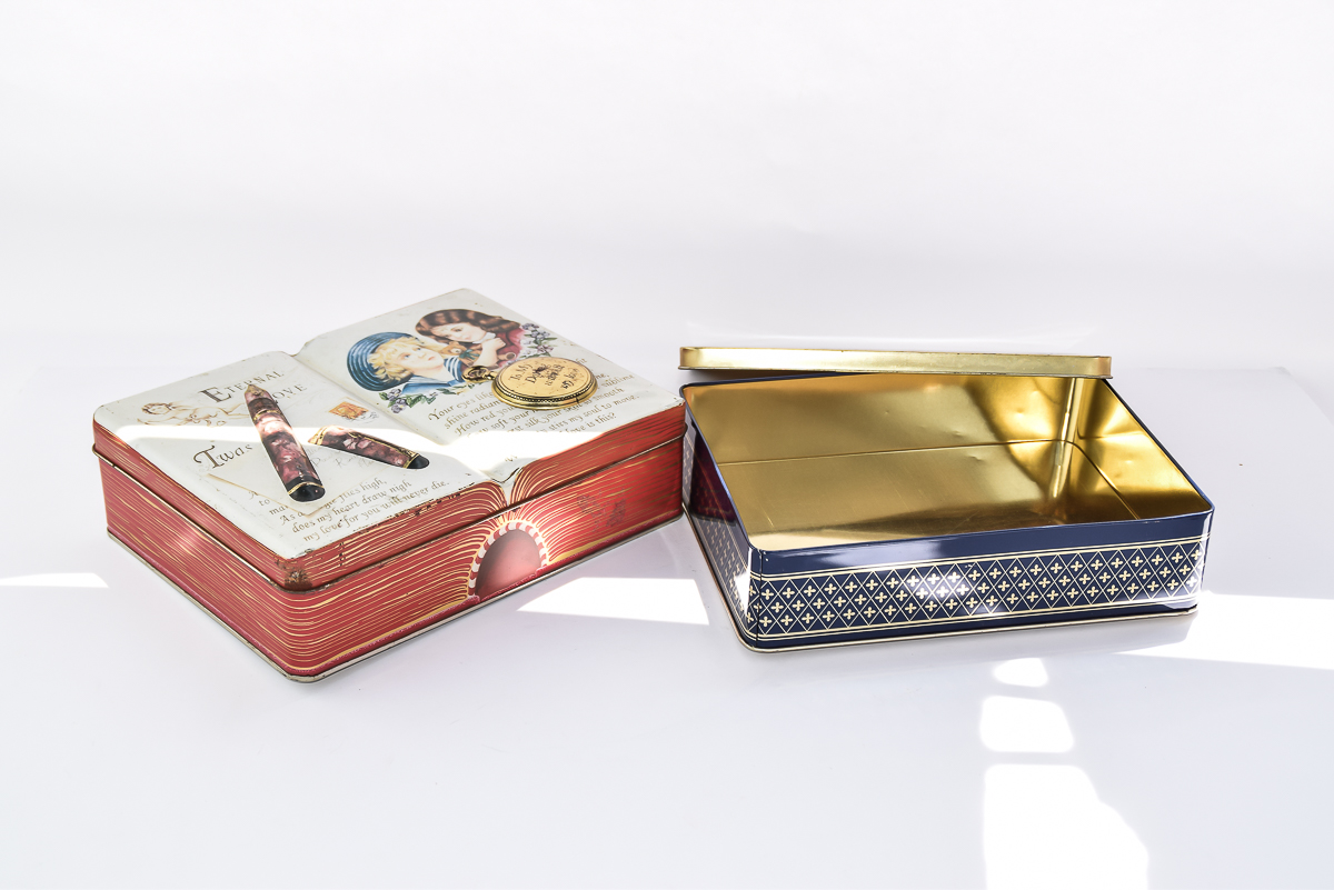 Pair of Vintage Hummel and Silver Crane Co. Tins