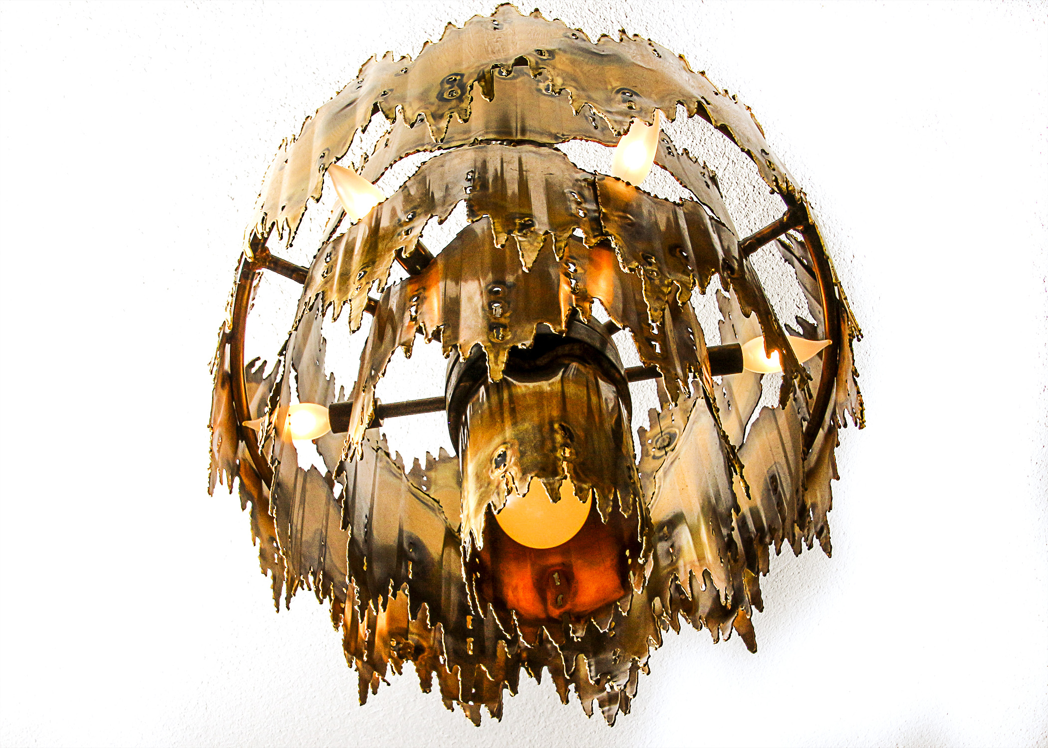 1970s Torch Cut Brass Brutalist Chandelier by Tom A. Greene for The Feldman Company
