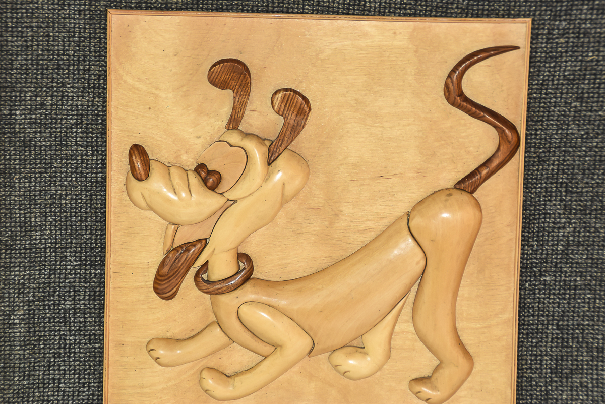 Carved Pluto Art