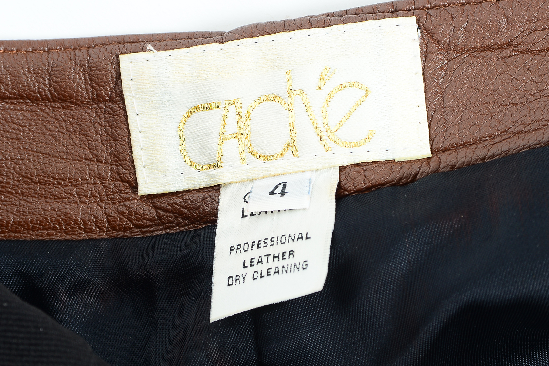 Collection of Women's Clothes Including Cache