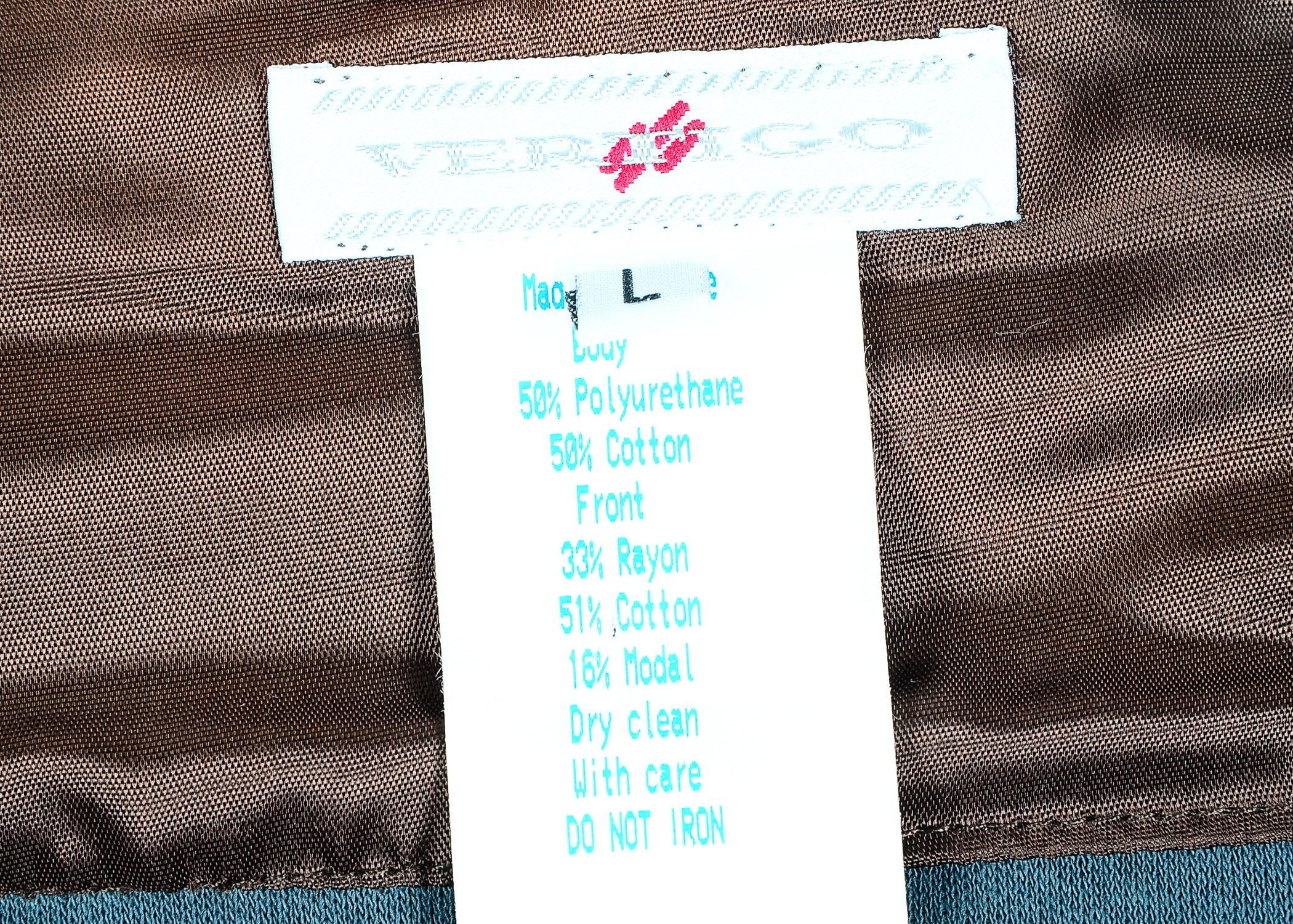 Collection of Women's Clothes Including Cache