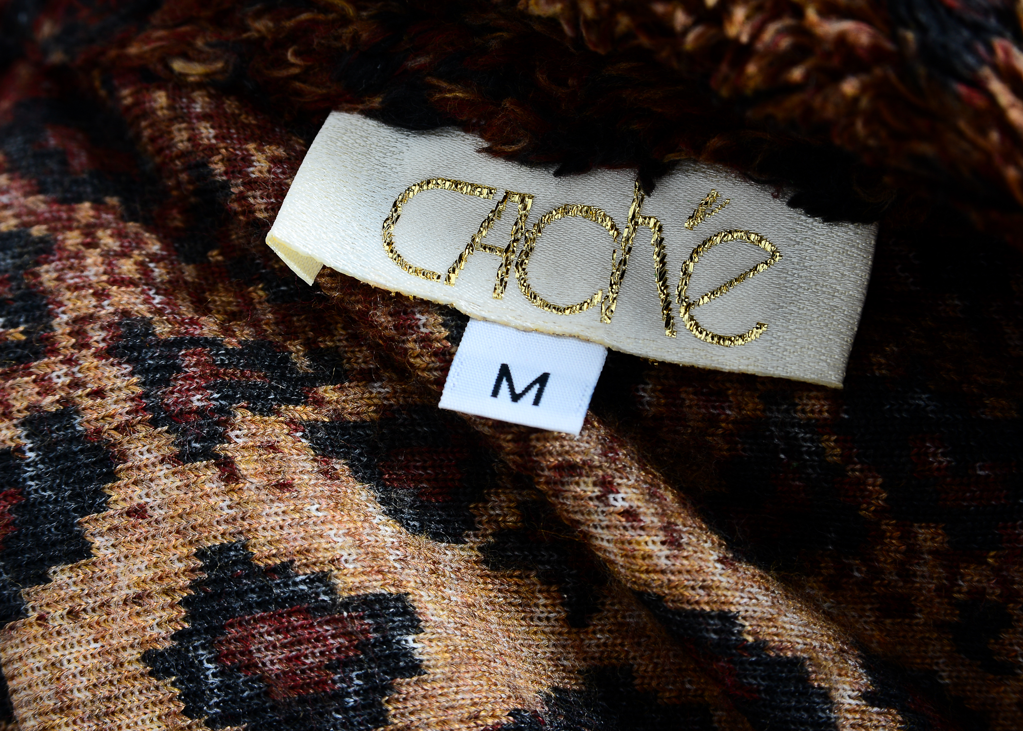 Collection of Women's Clothes Including Cache