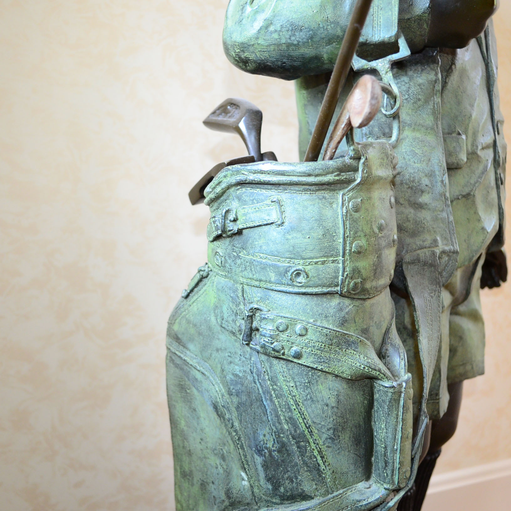 Metal Alloy Sculpture Of Young Golf Caddy
