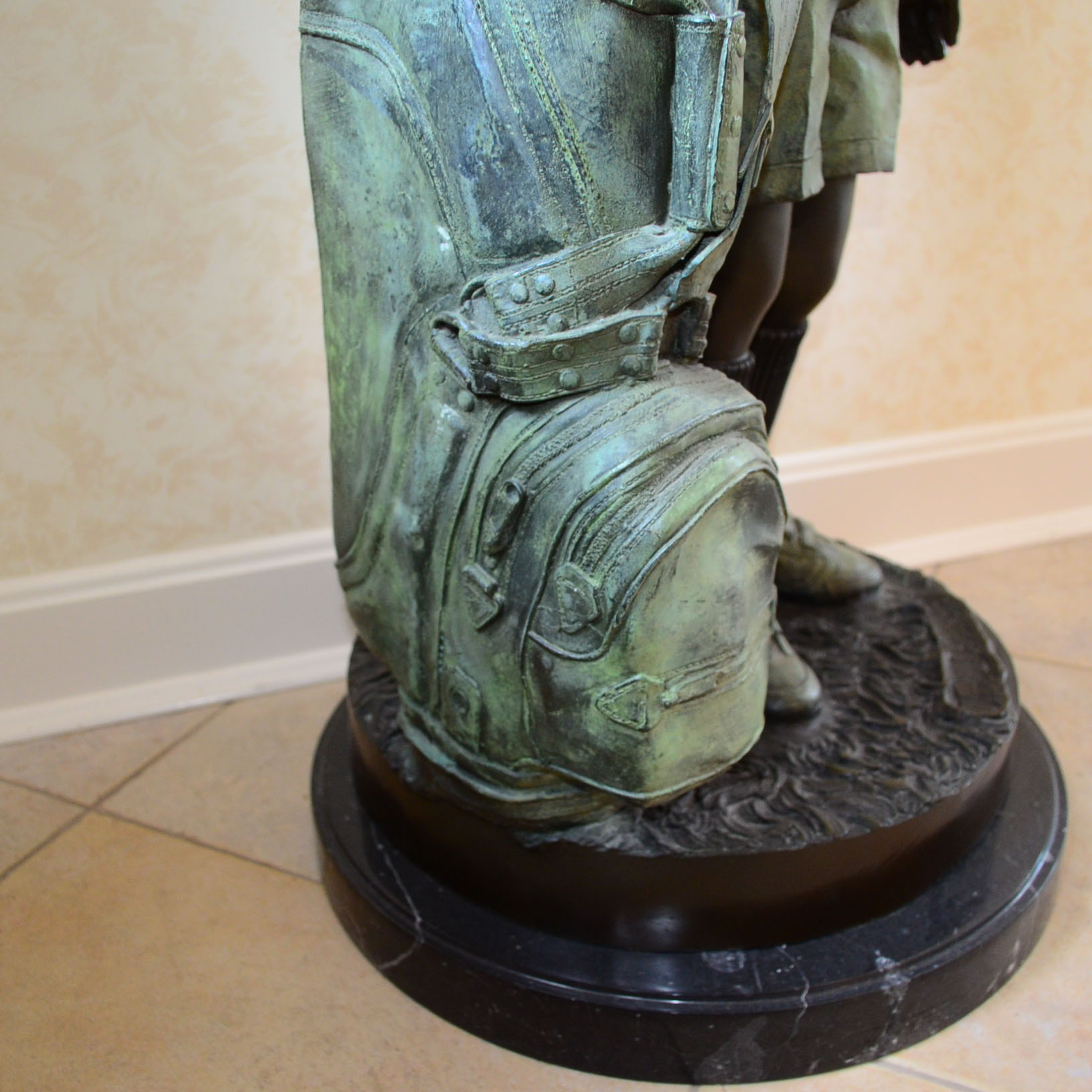 Metal Alloy Sculpture Of Young Golf Caddy