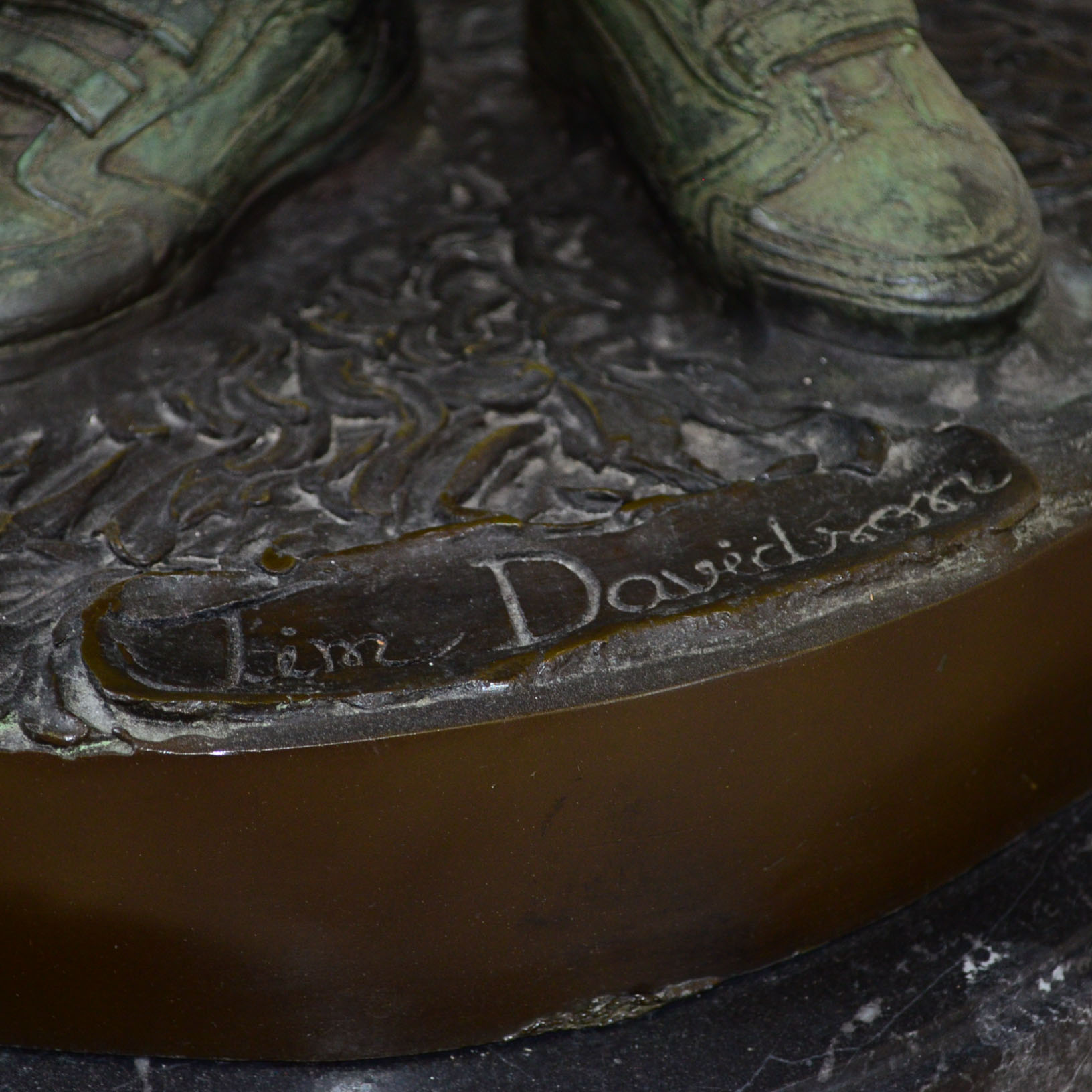 Metal Alloy Sculpture Of Young Golf Caddy