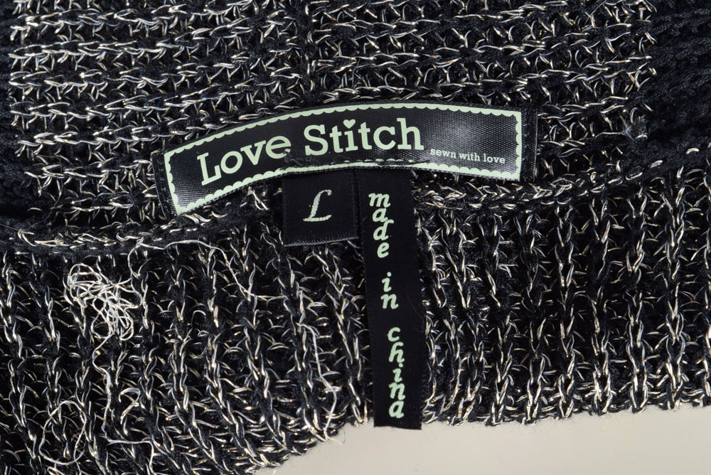 Large Collection of Women's Clothes Including a pair of Pants Autographed by Tanya Tucker