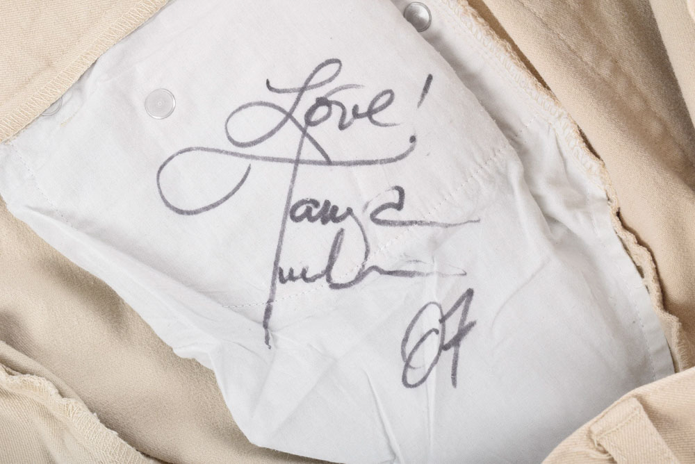 Large Collection of Women's Clothes Including a pair of Pants Autographed by Tanya Tucker