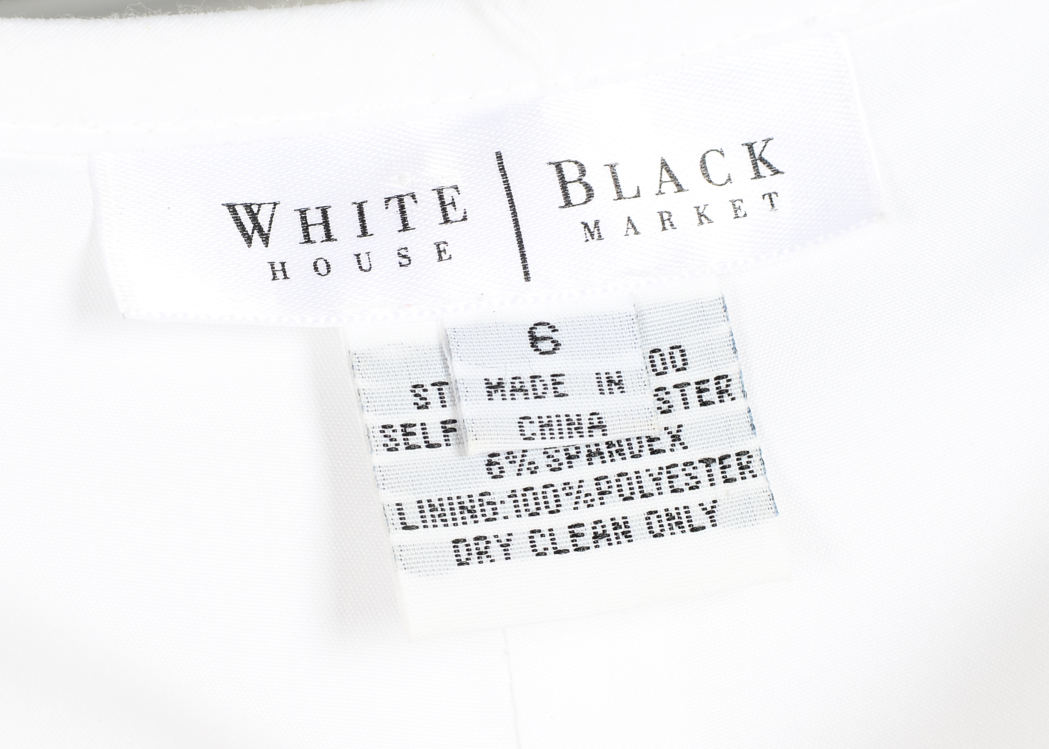 A Group of Women's Clothing Including Nygard Collection, and White House Black Market