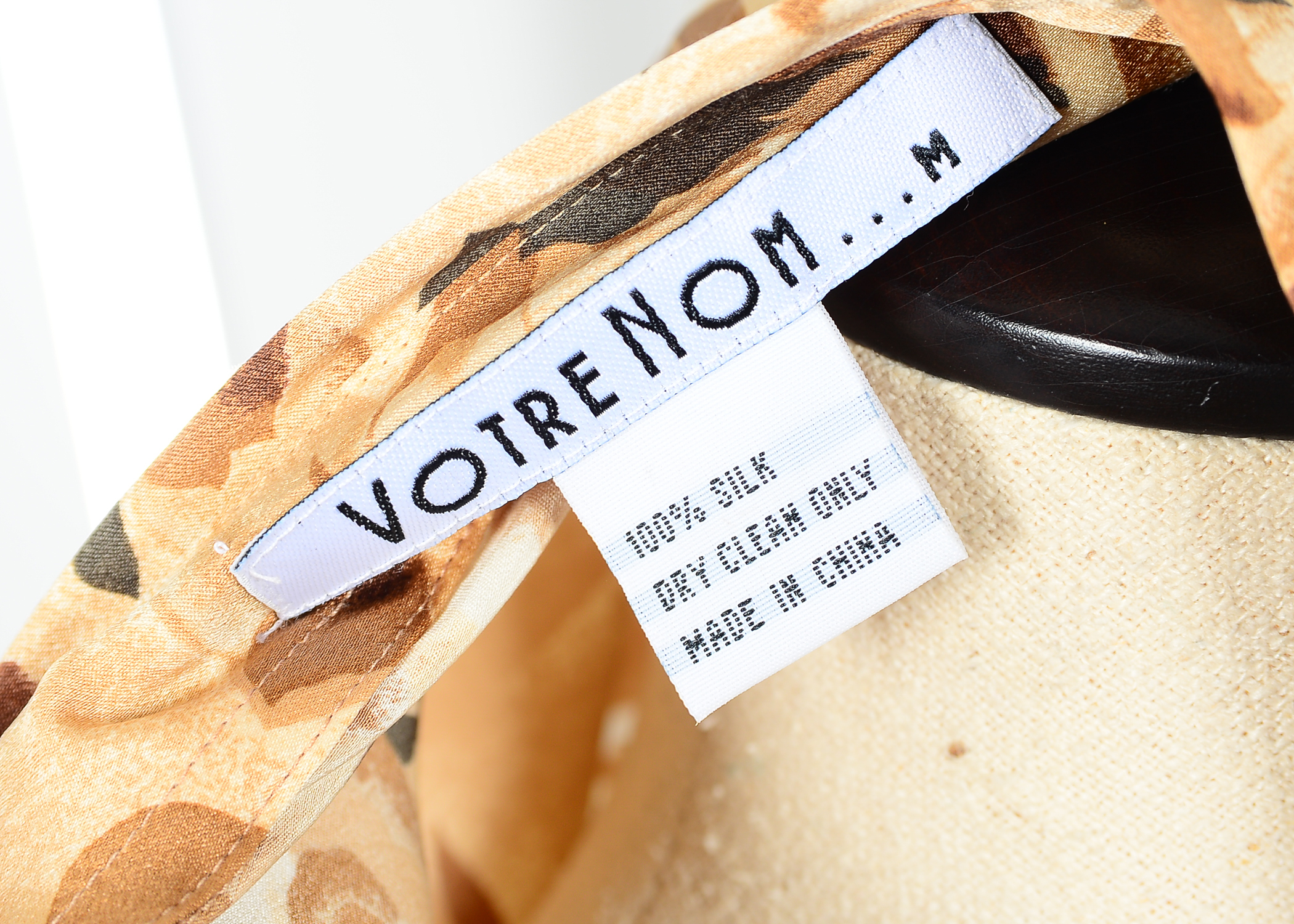 A Group of Women's Clothing Including a 100% Silk Blouse from Votre Nom