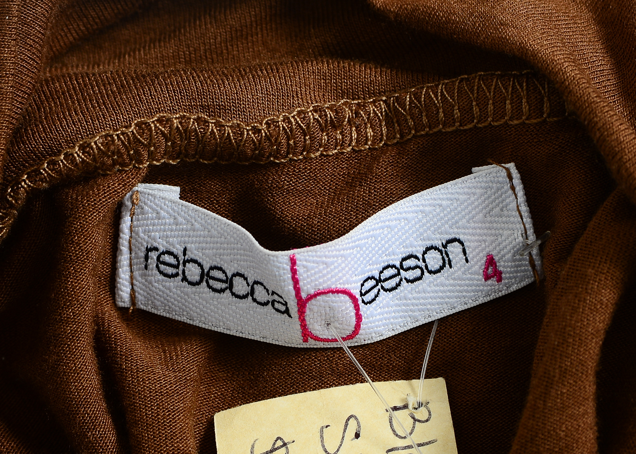 Large Collection of Women's Clothes Including DKNY, Cache, and The North Face