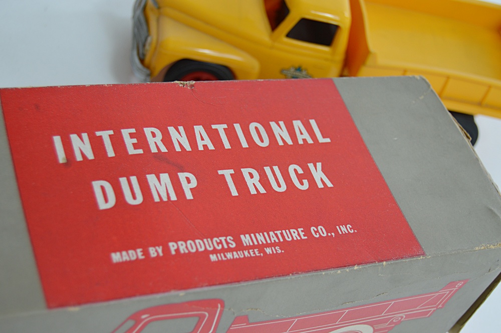 Three 1950s International Plastic Toy Trucks with Boxes
