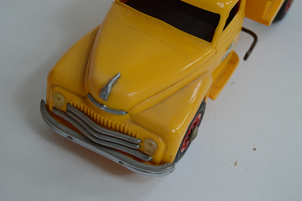 Three 1950s International Plastic Toy Trucks with Boxes