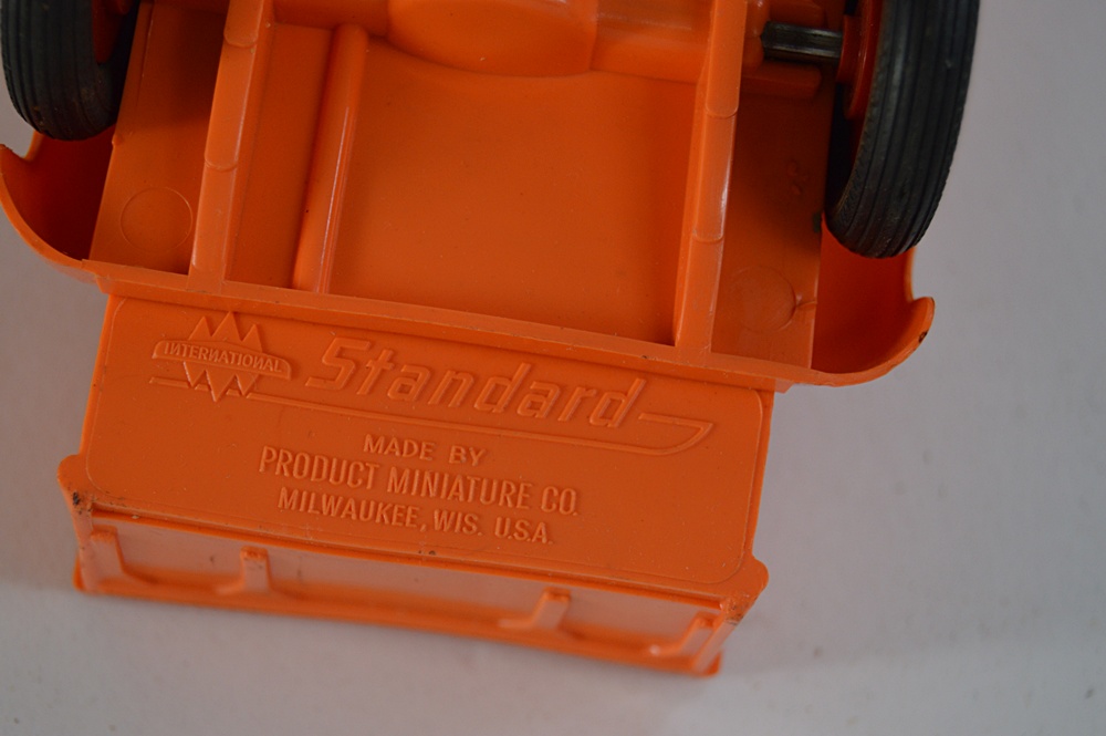 Three 1950s International Plastic Toy Trucks with Boxes