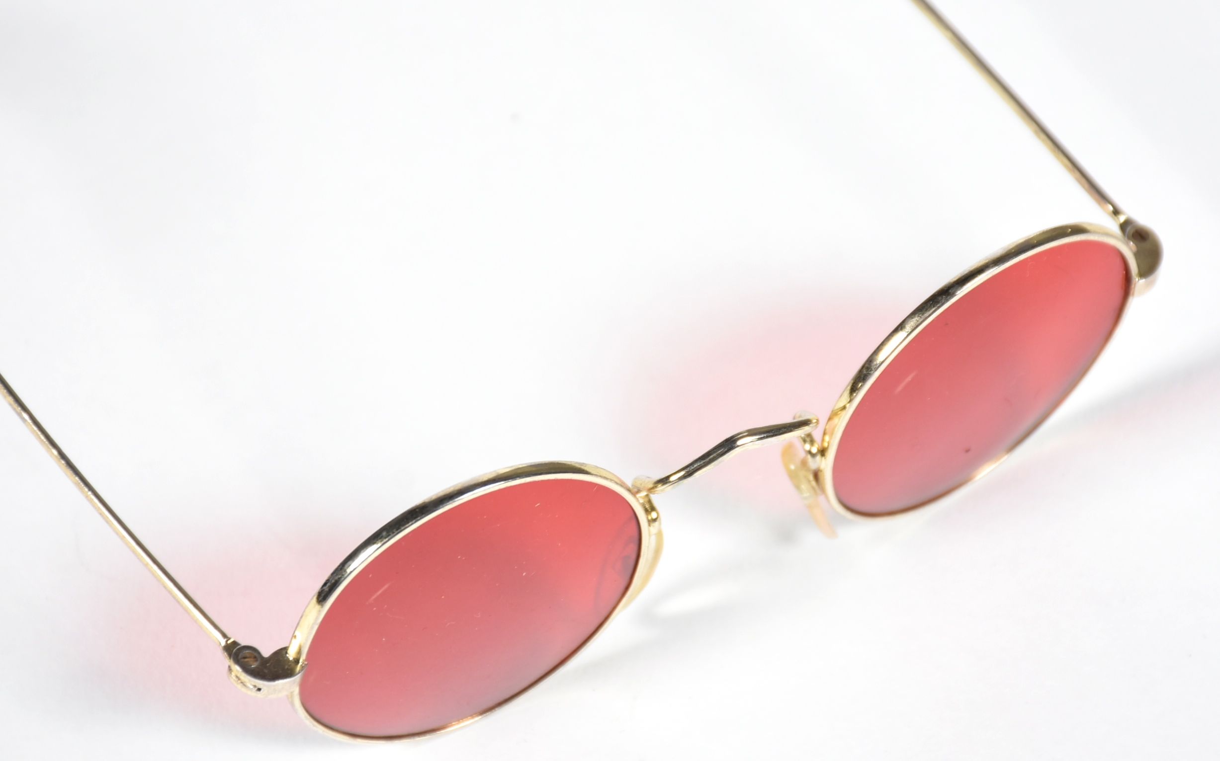 Pair of Sunglasses with Red Lenses and Goldtone Metal Frames Tanya Wore for her "Hangin In" Video