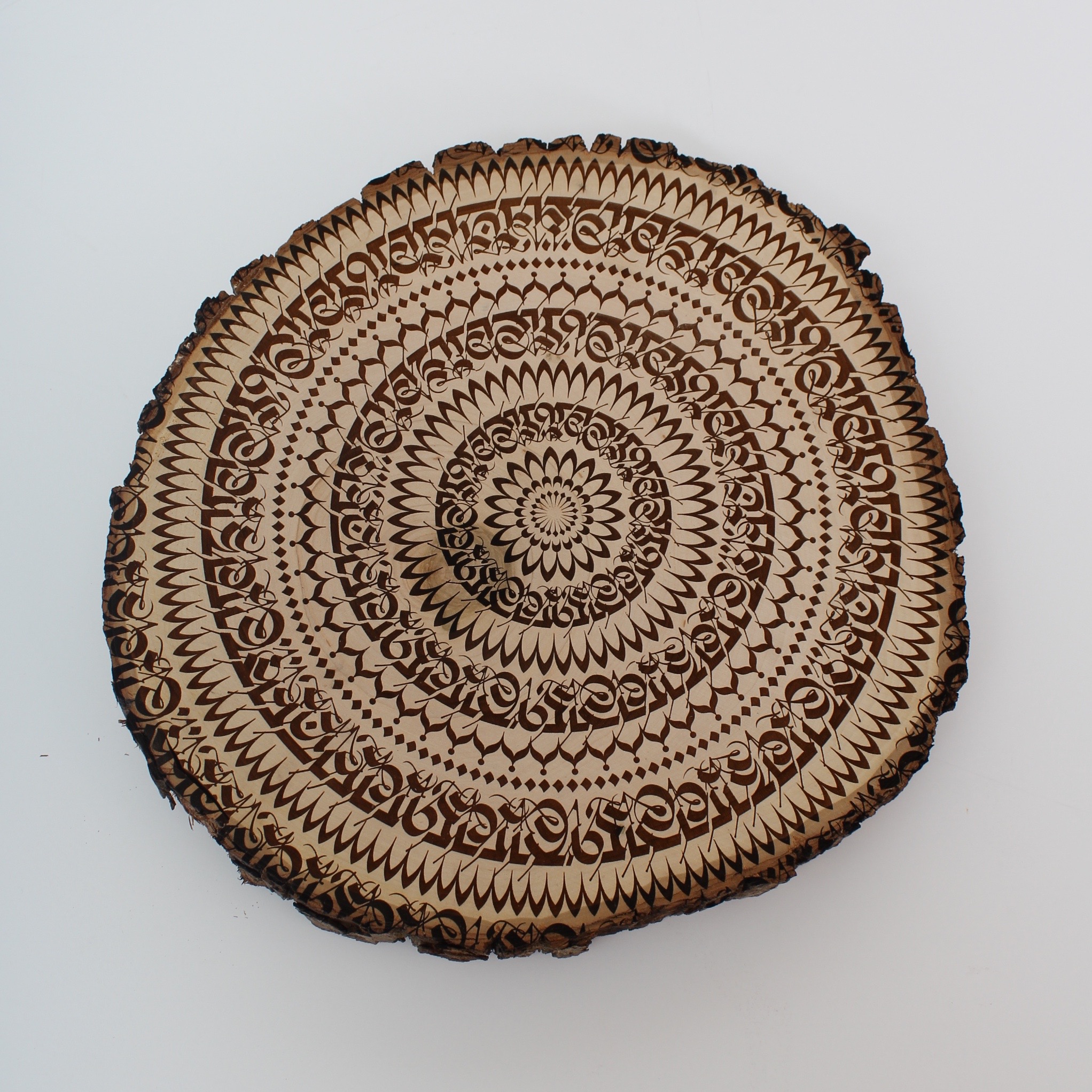 Cryptik Engraved "Mantradala" Wood Slice
