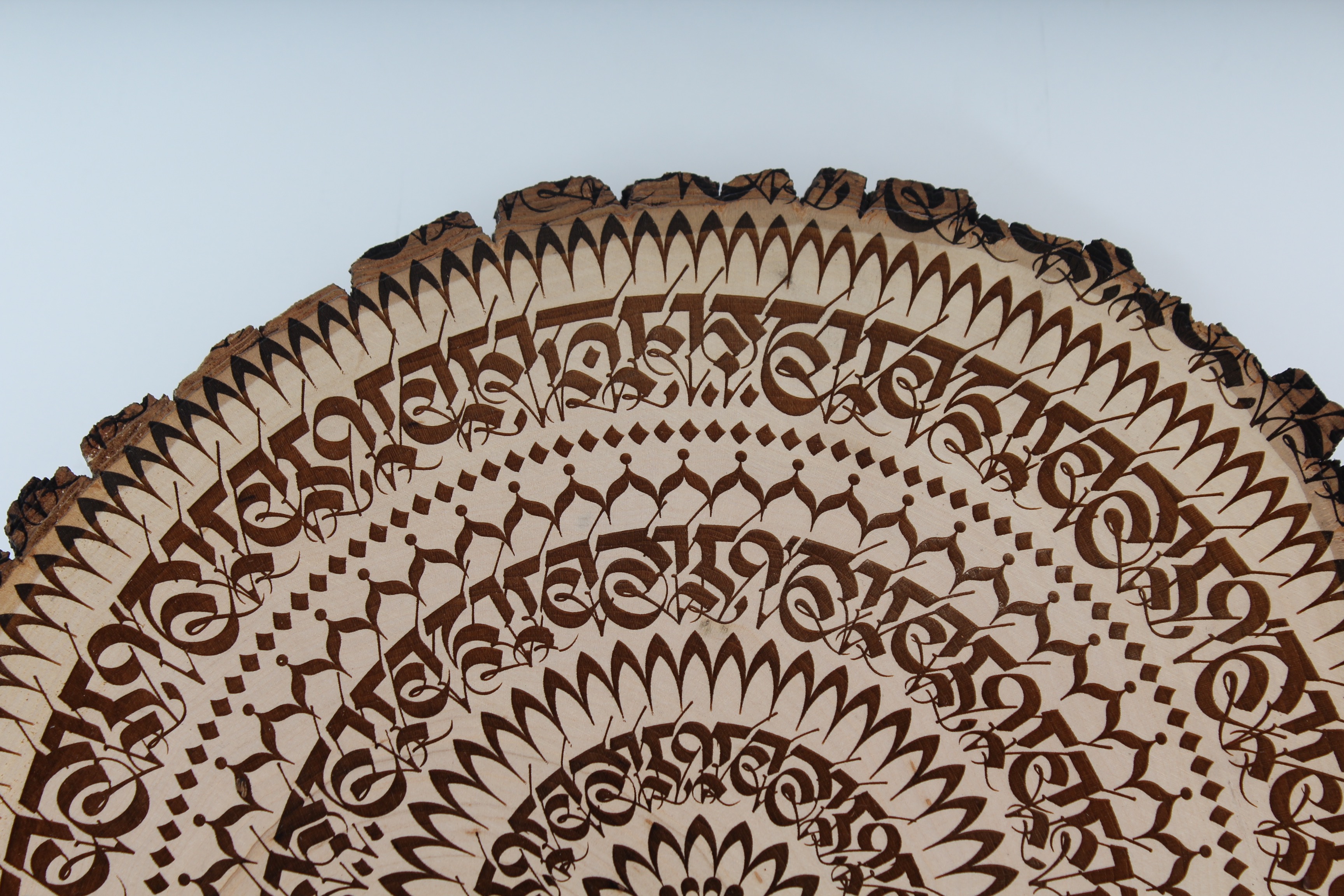 Cryptik Engraved "Mantradala" Wood Slice