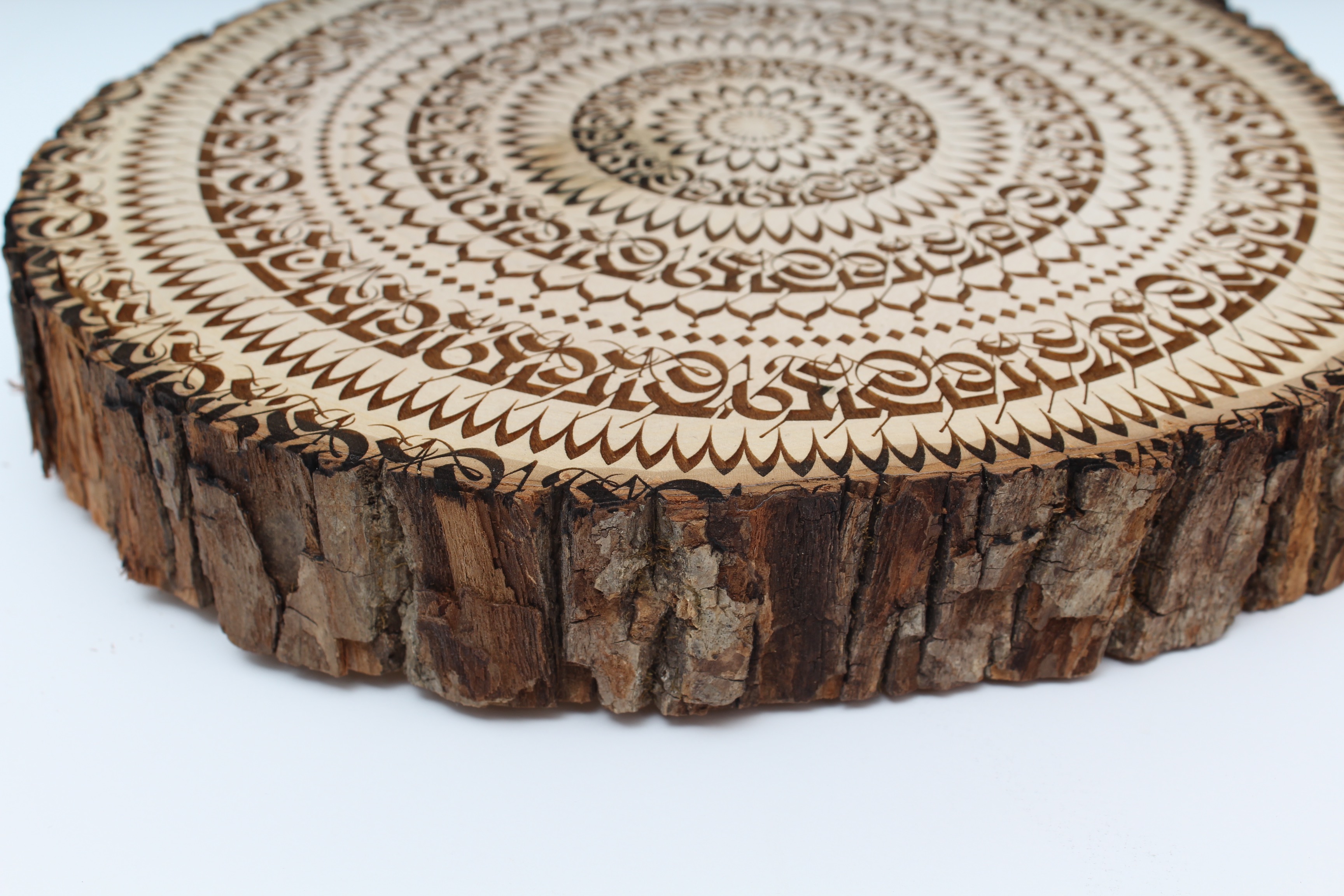 Cryptik Engraved "Mantradala" Wood Slice