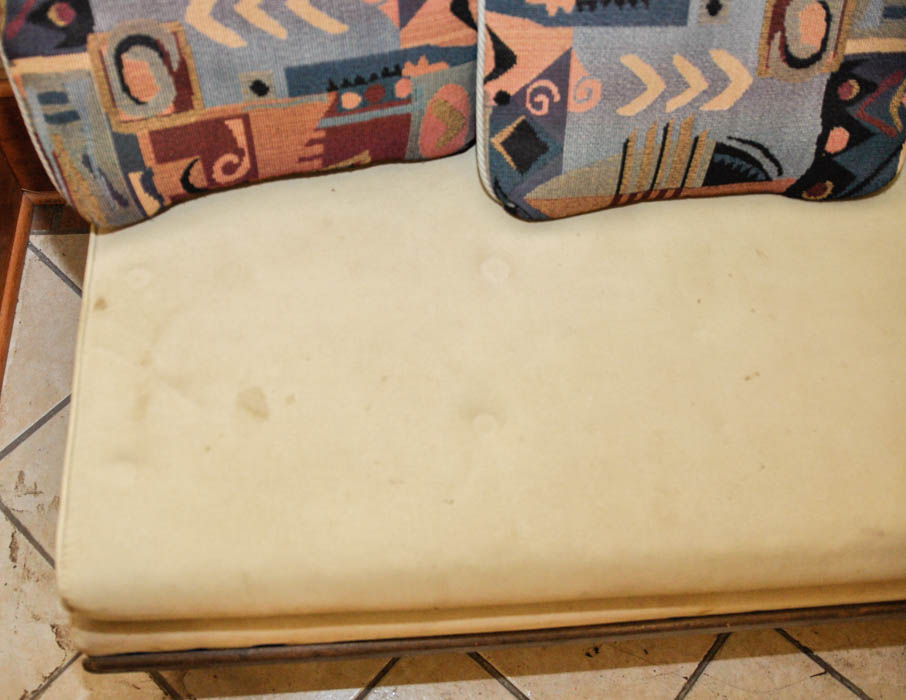 Beige Sofa with Accent Pillows