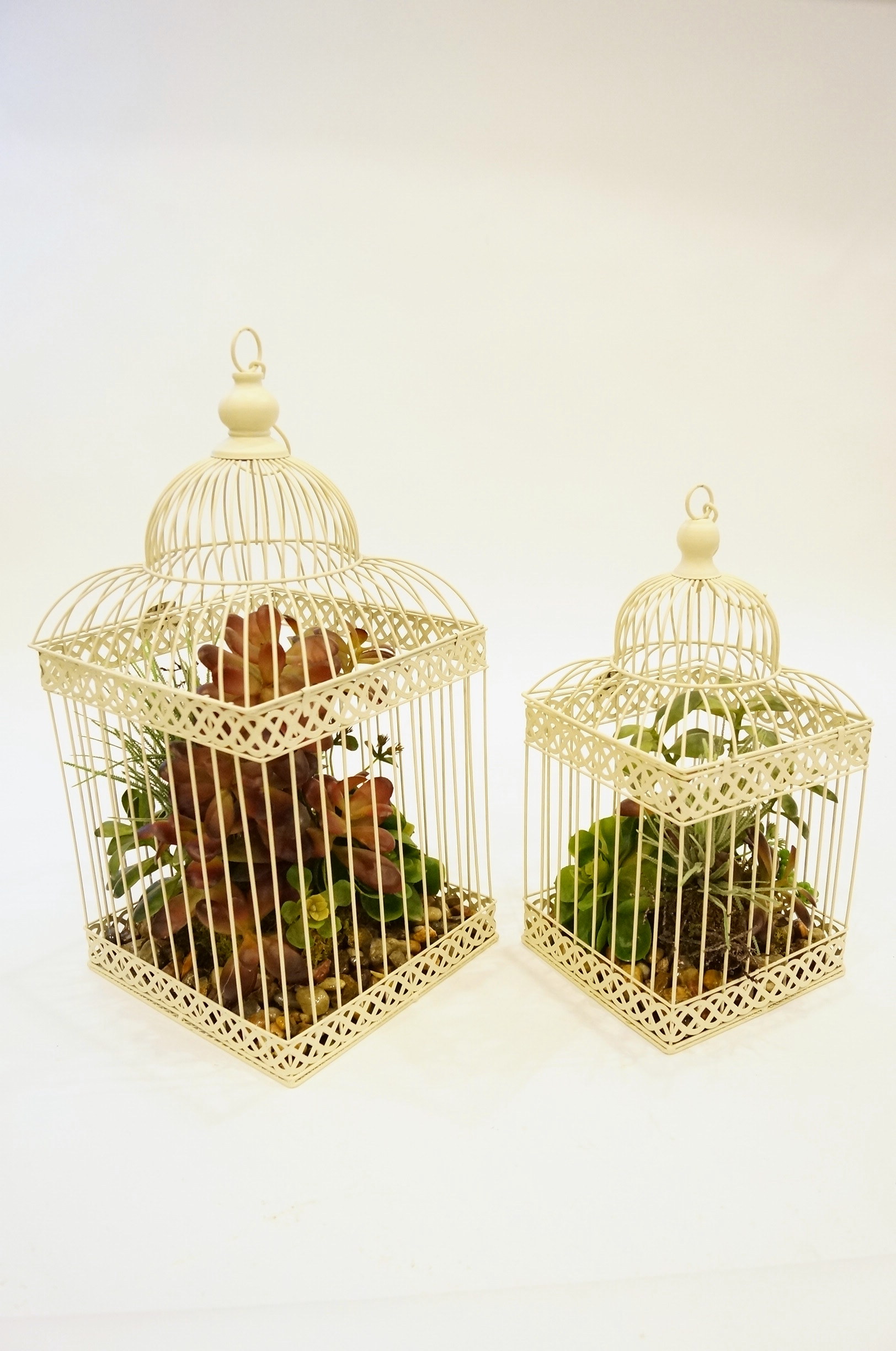 Pair of Birdhouses with Greenery