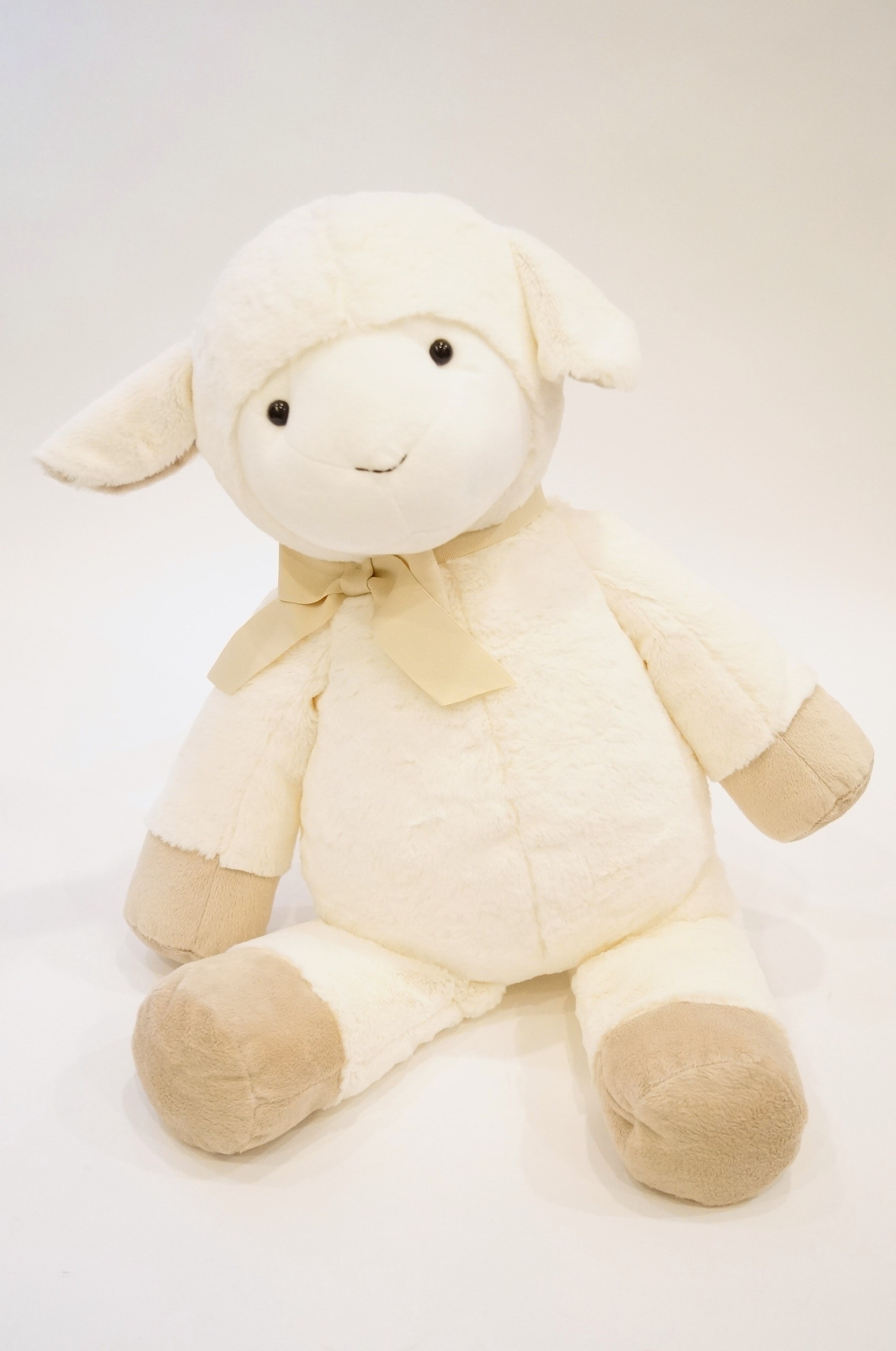 Stuffed Lamb and Two Baby Books