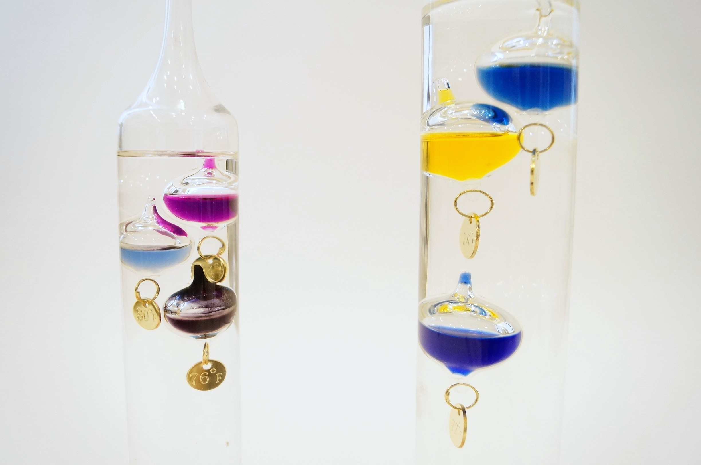 Pair of Glass Galileo Thermometers