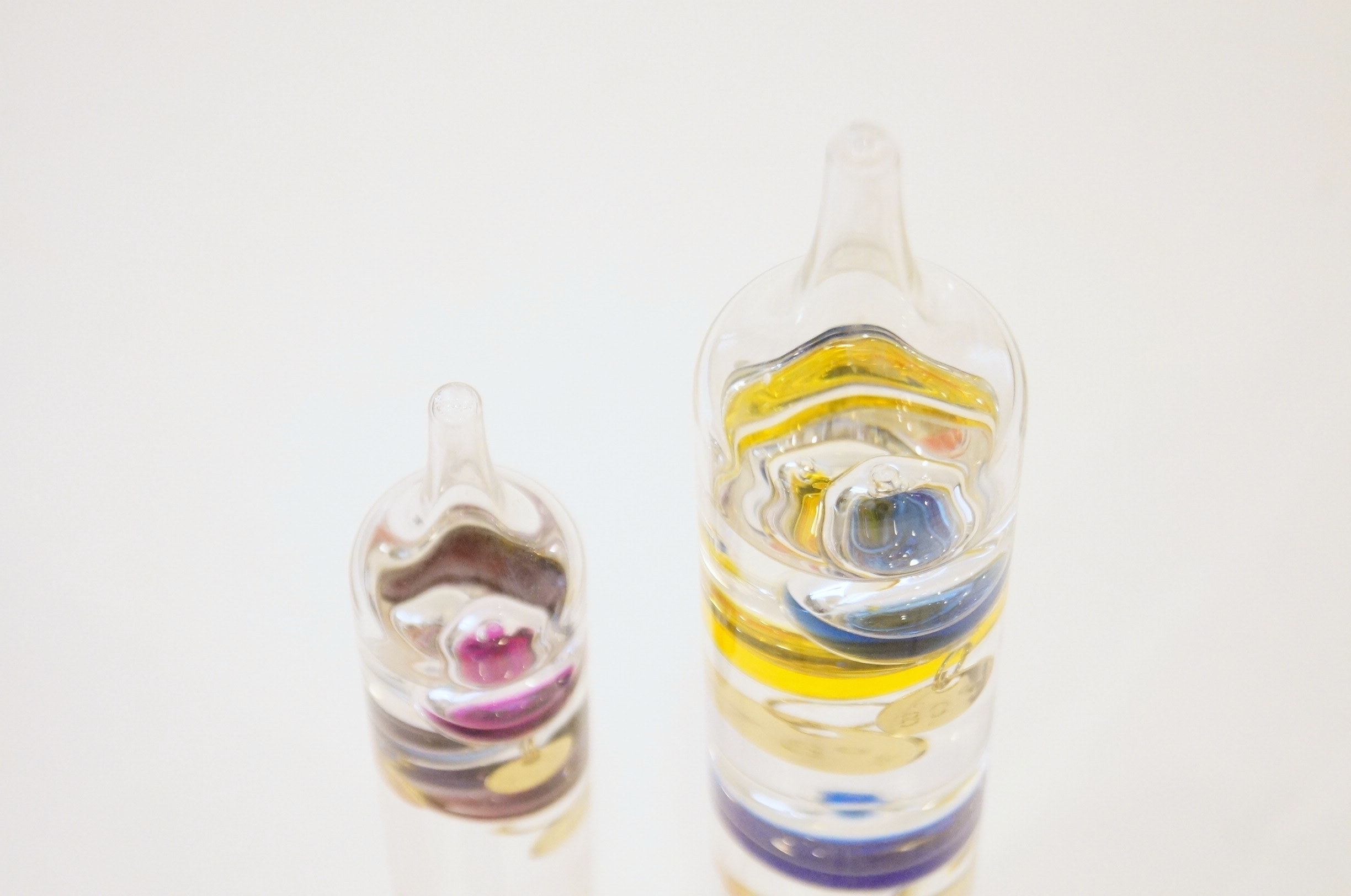 Pair of Glass Galileo Thermometers