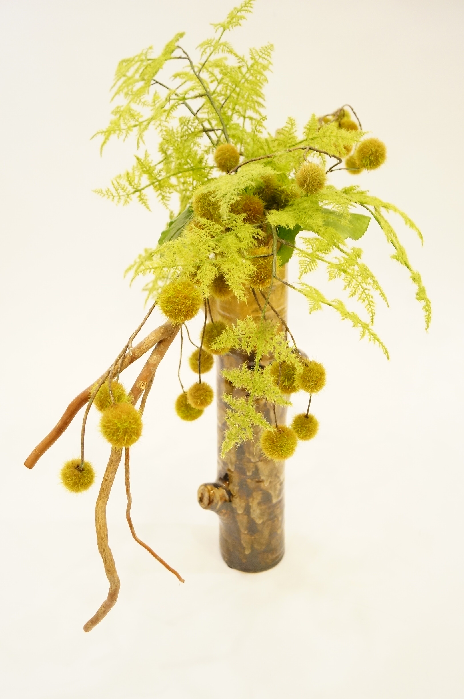 Faux Floral Arrangement in Ceramic Vase