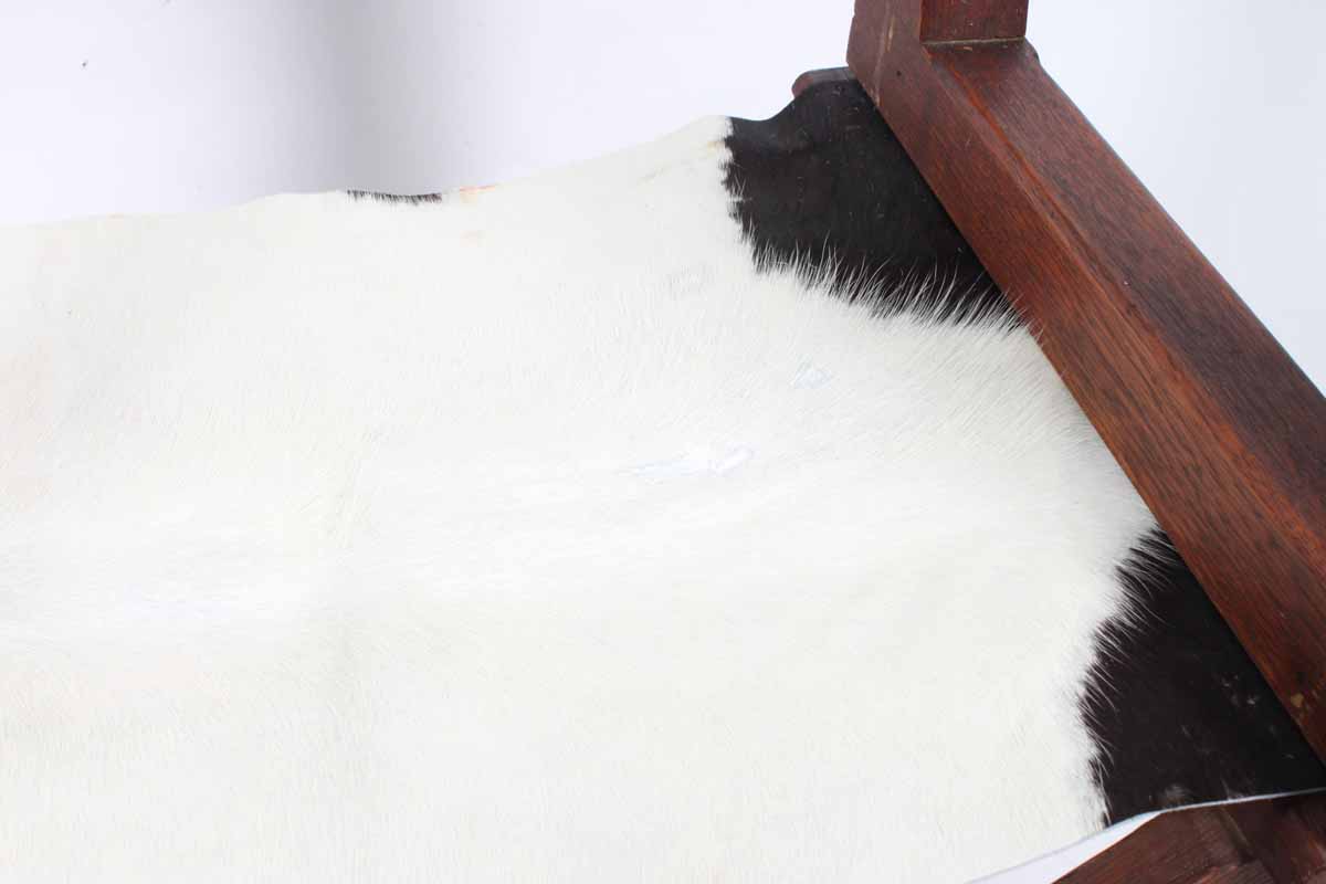 Antique Campaign War Chair with Cowhide Seat and Back