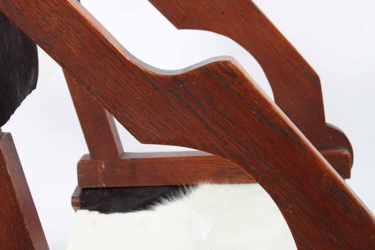 Antique Campaign War Chair with Cowhide Seat and Back