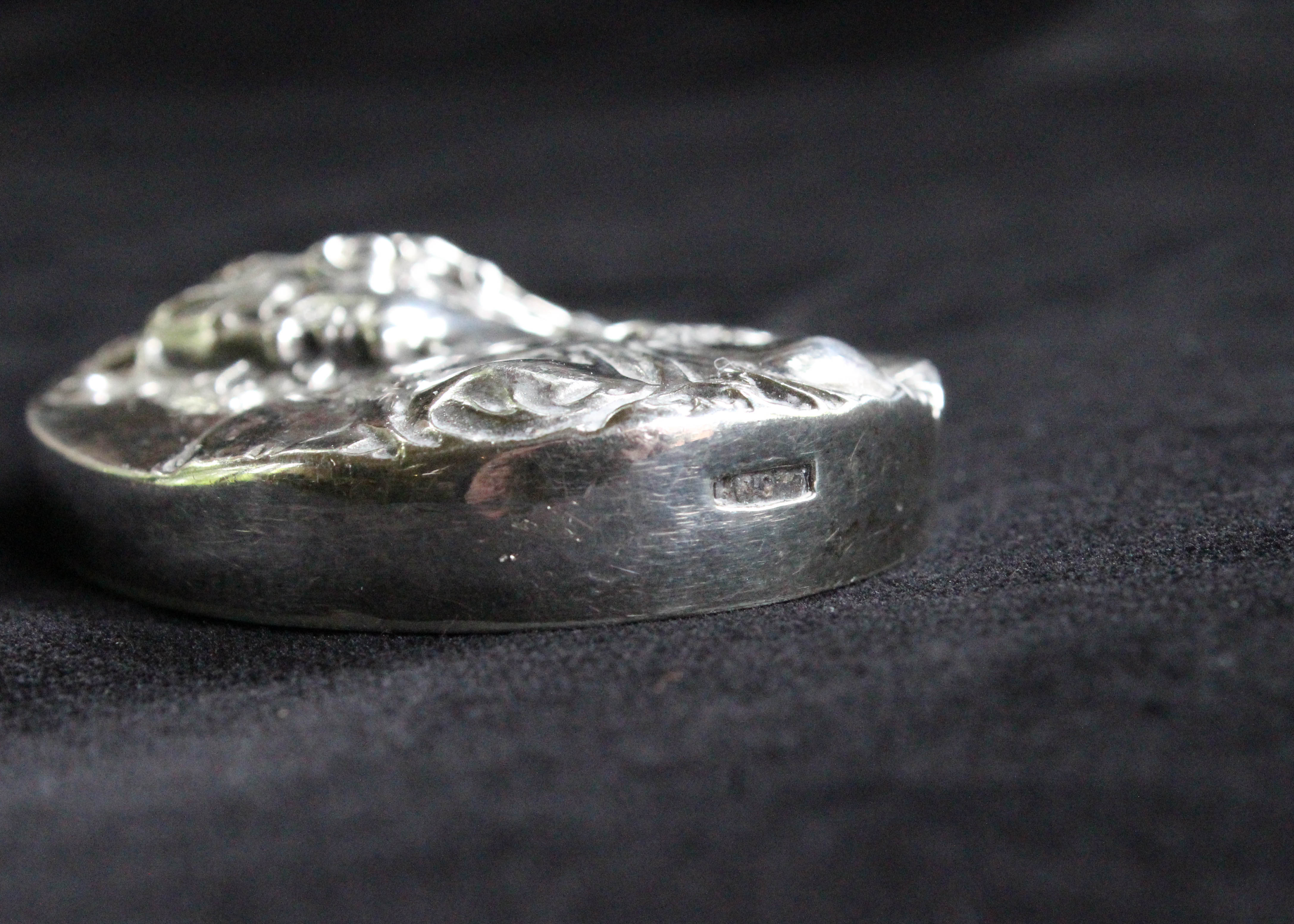 Silver Tone Pendant with Image of a Woman