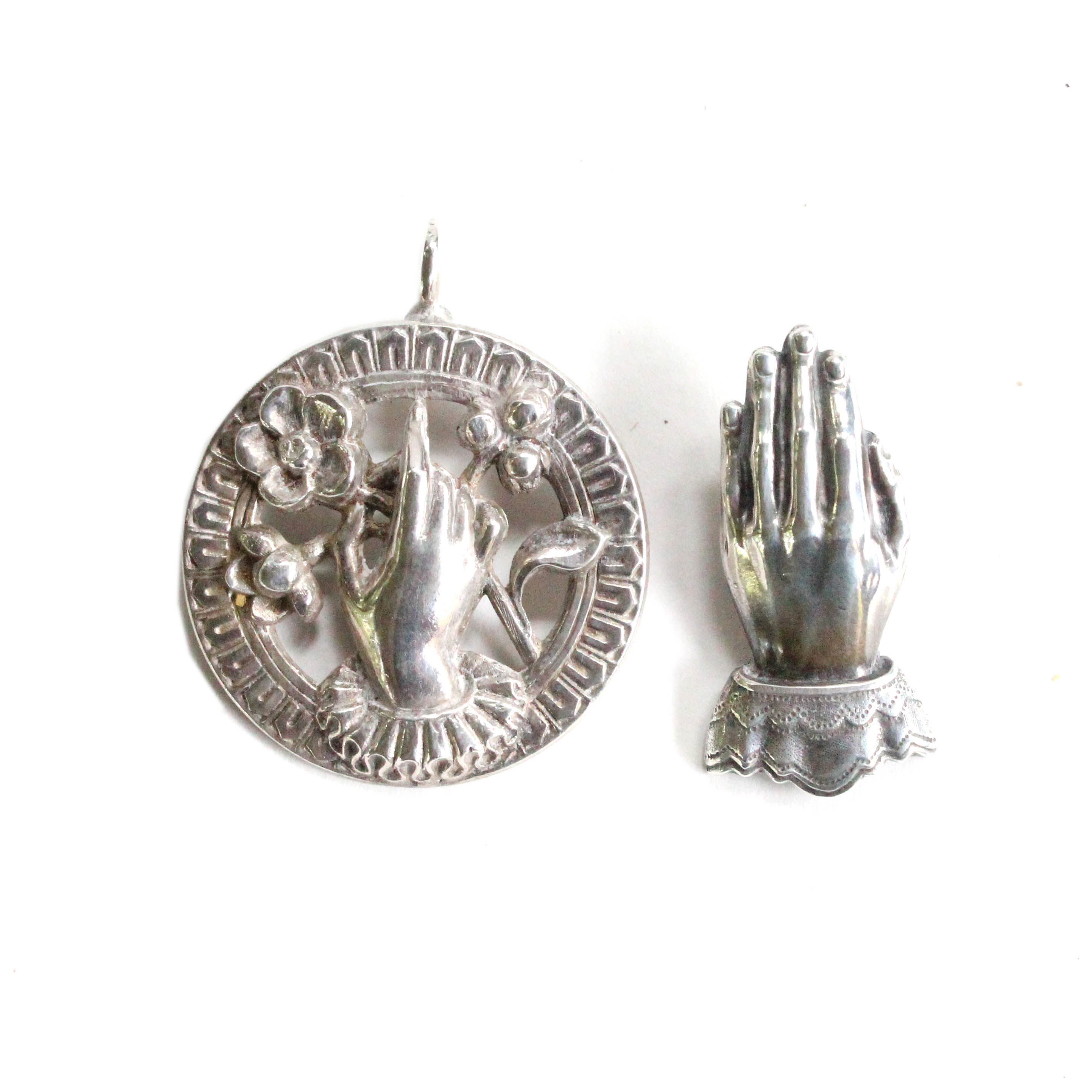 Pair of Antique Sterling Silver Jewelry Pieces with Hands