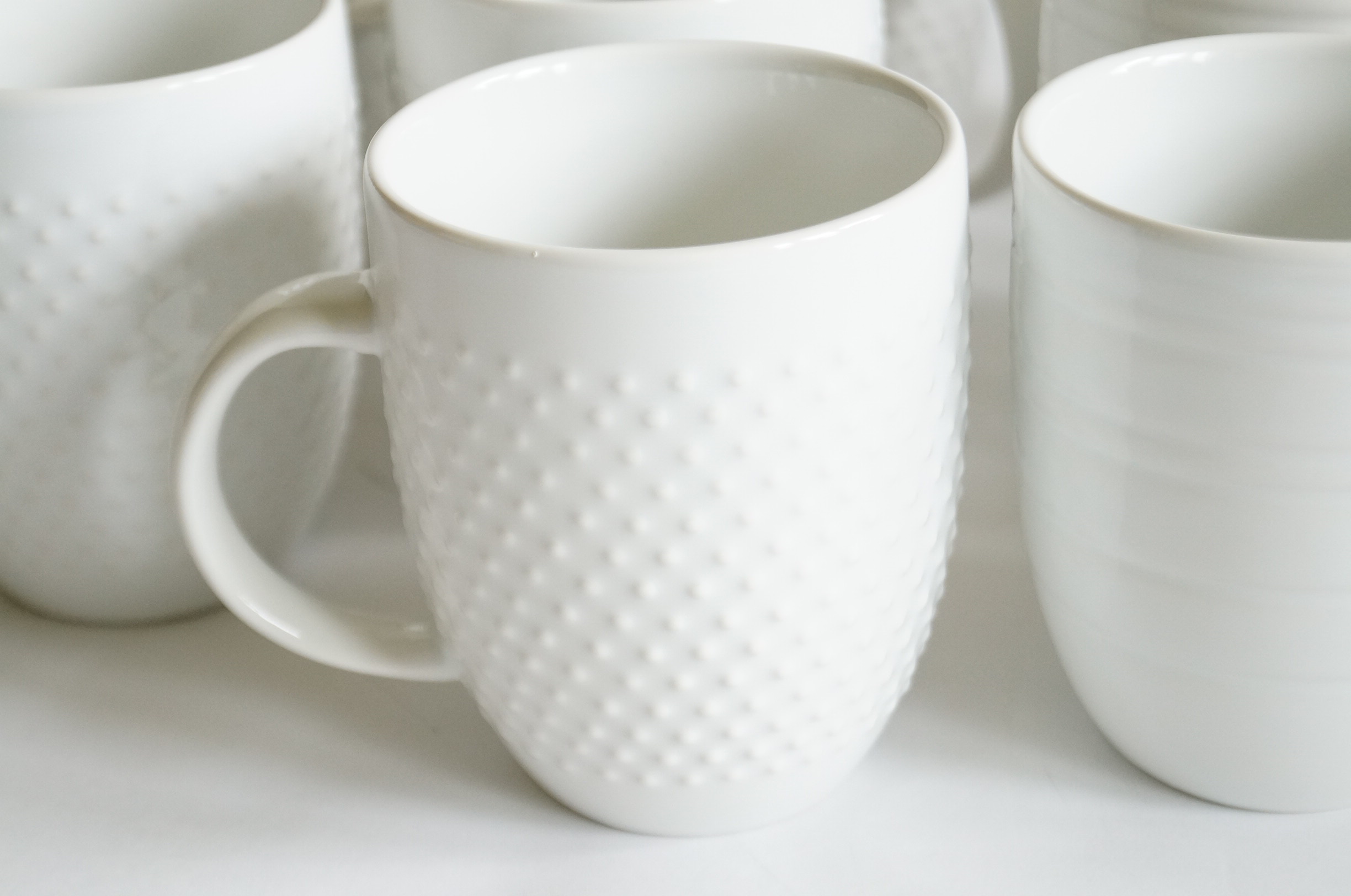 Assortment of Coffee Mugs and Drinking Glasses