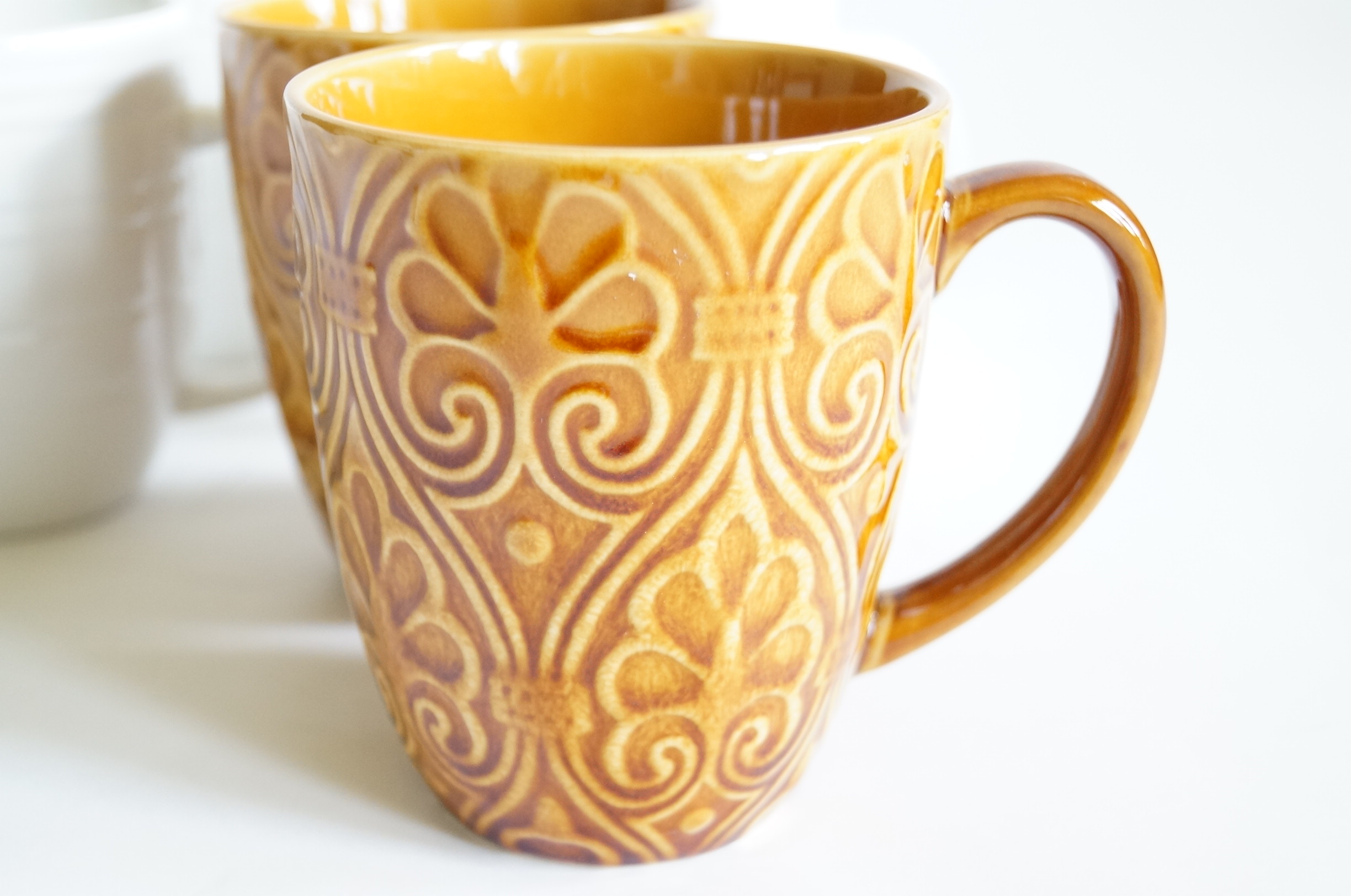 Assortment of Coffee Mugs and Drinking Glasses