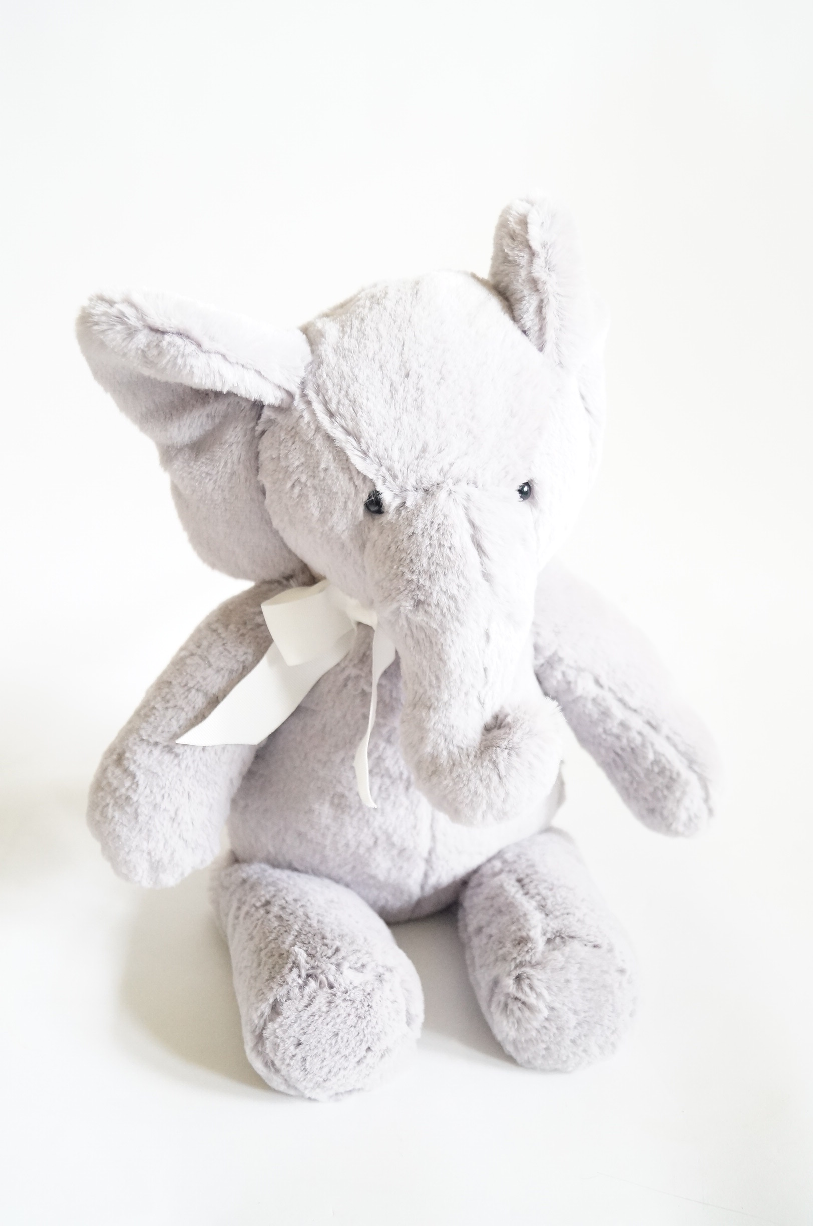 Basket of Stuffed Animals and Sleep Sheep