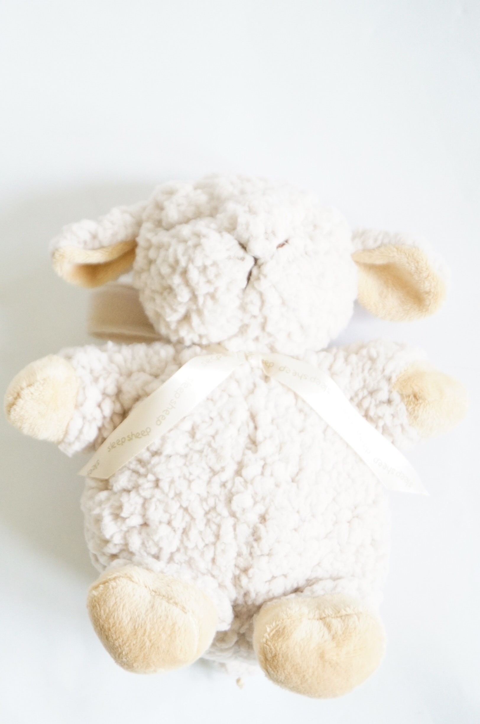 Basket of Stuffed Animals and Sleep Sheep