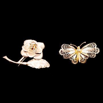 Pair of Sterling Silver Pins