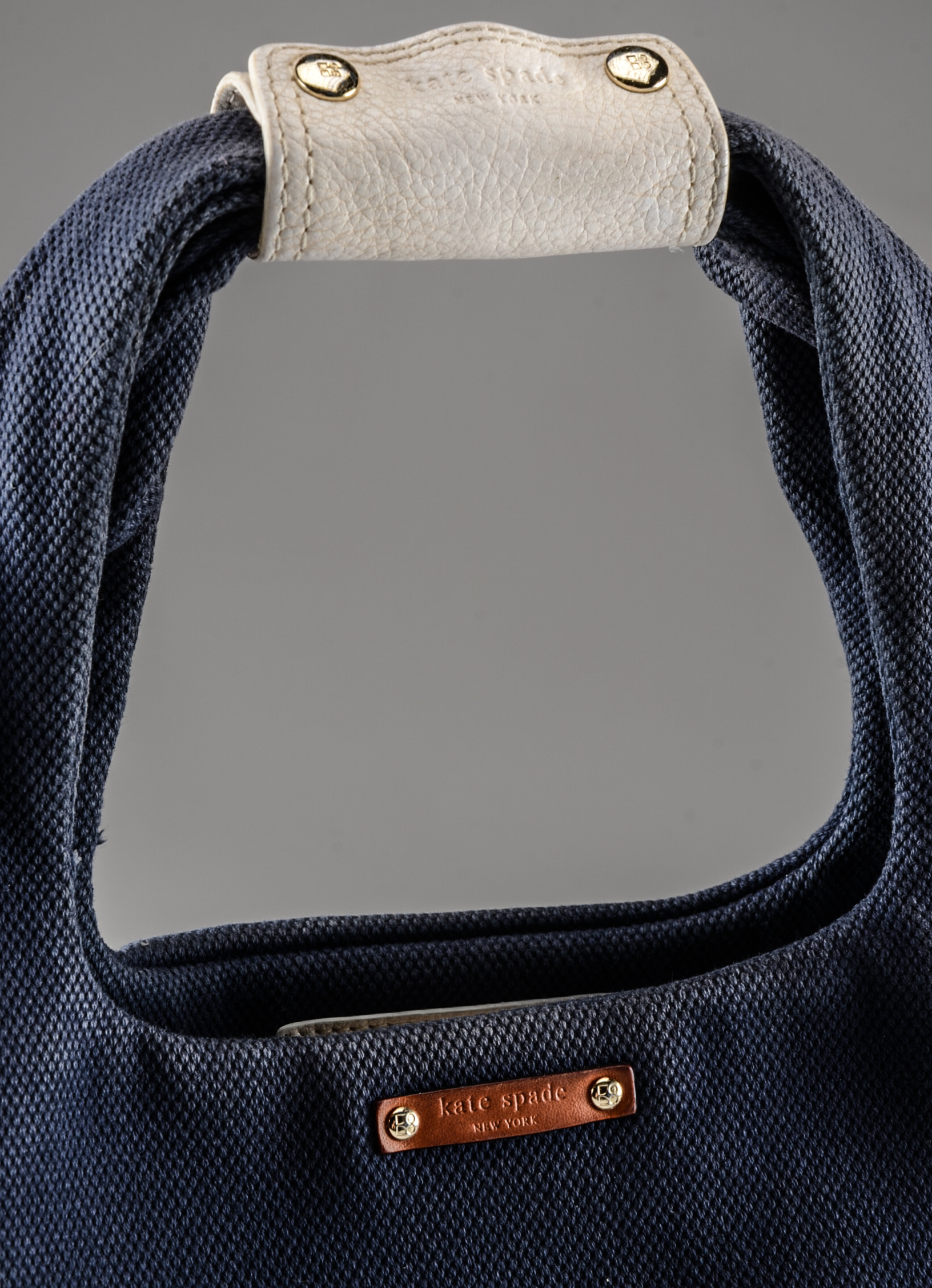 Kate Spade of New York Canvas and Pebbled Leather Handbag