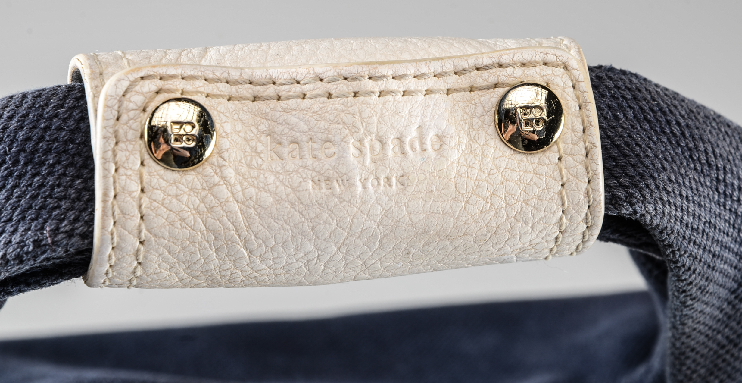 Kate Spade of New York Canvas and Pebbled Leather Handbag