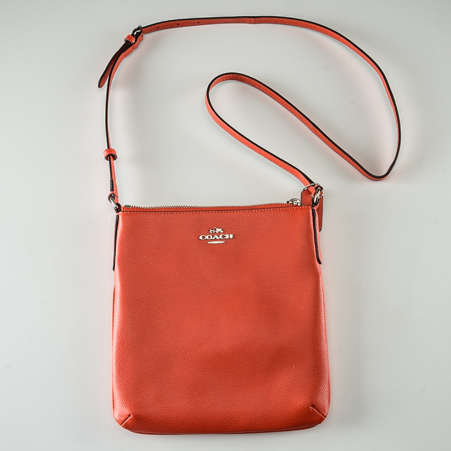 Coach North South Crossbody Bag in Orange Leather