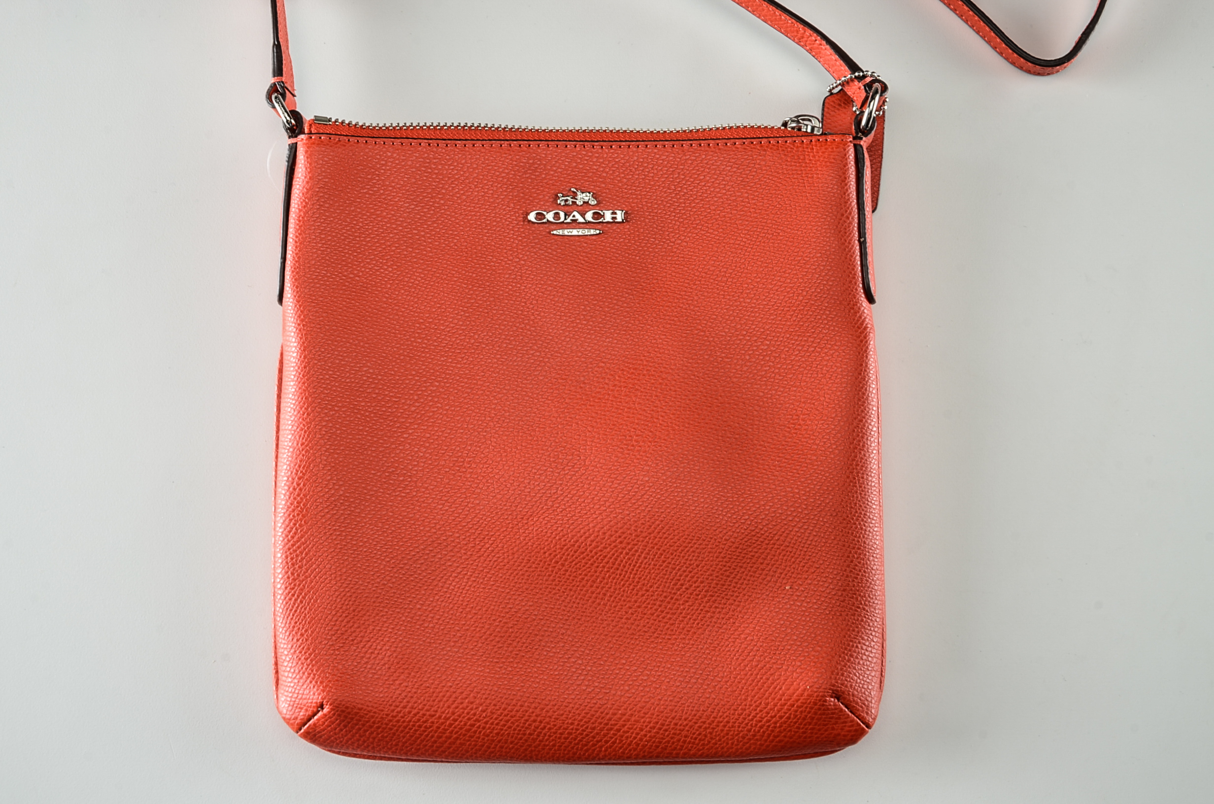 Coach North South Crossbody Bag in Orange Leather