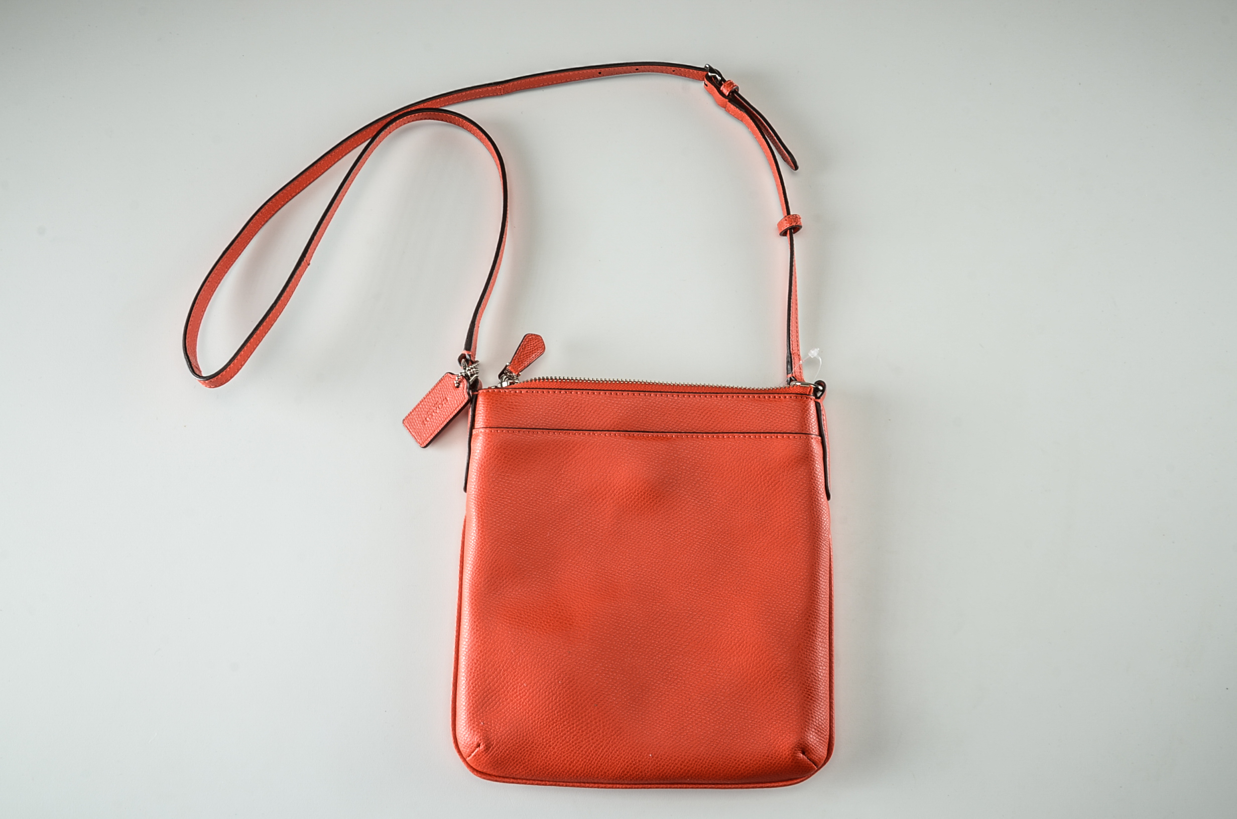 Coach North South Crossbody Bag in Orange Leather