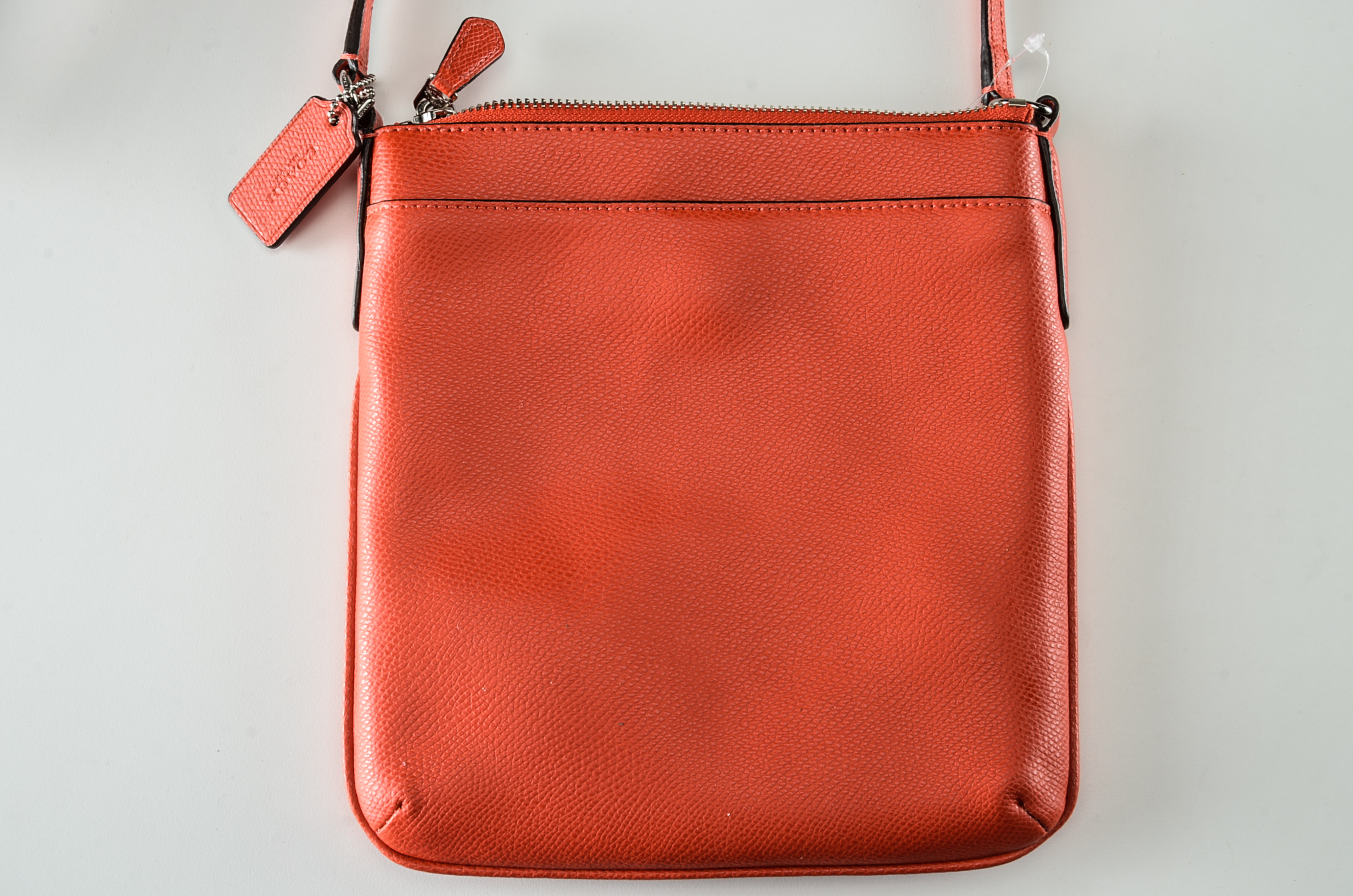 Coach North South Crossbody Bag in Orange Leather