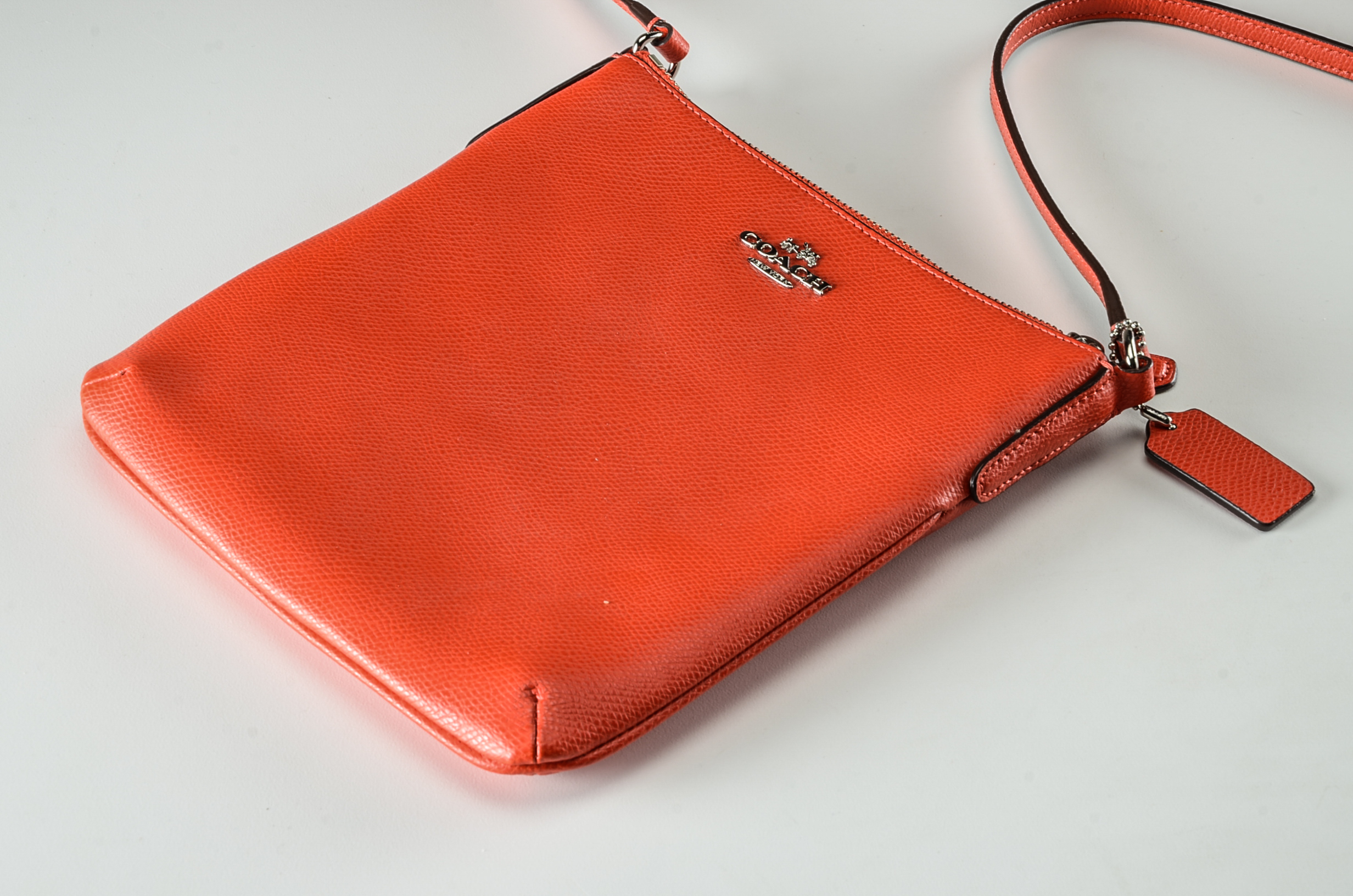 Coach North South Crossbody Bag in Orange Leather