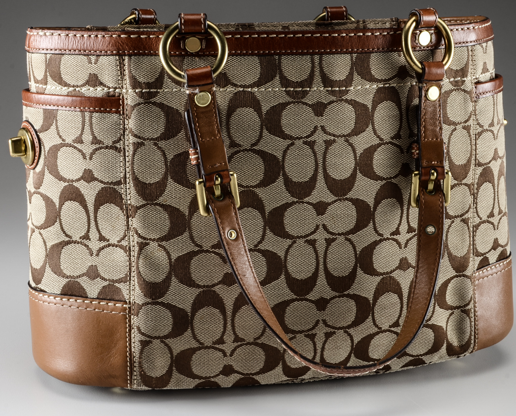 Two Signature Coach Monogram Handbags