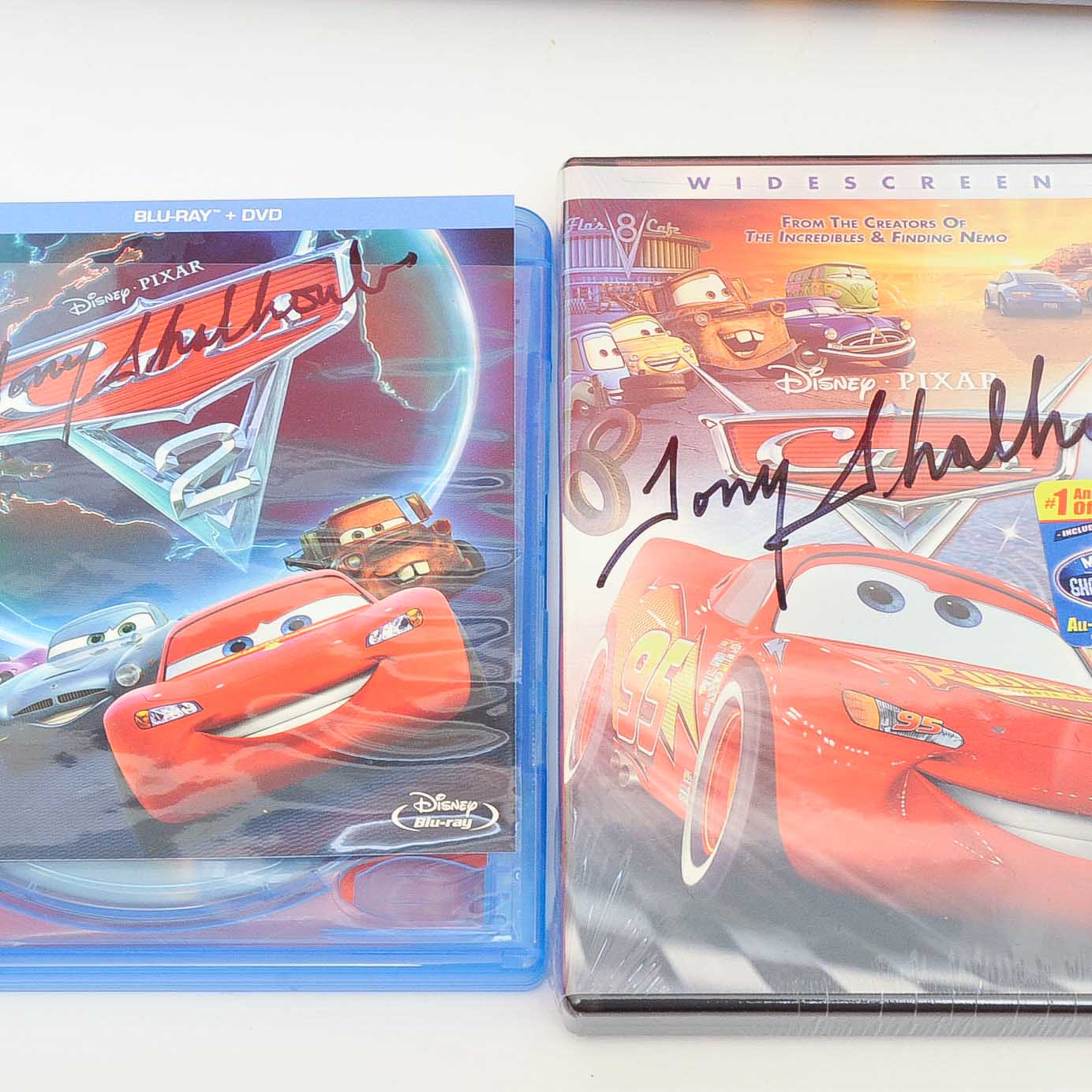 Collection of Signed "Cars" and "Cars 2" Memorabilia