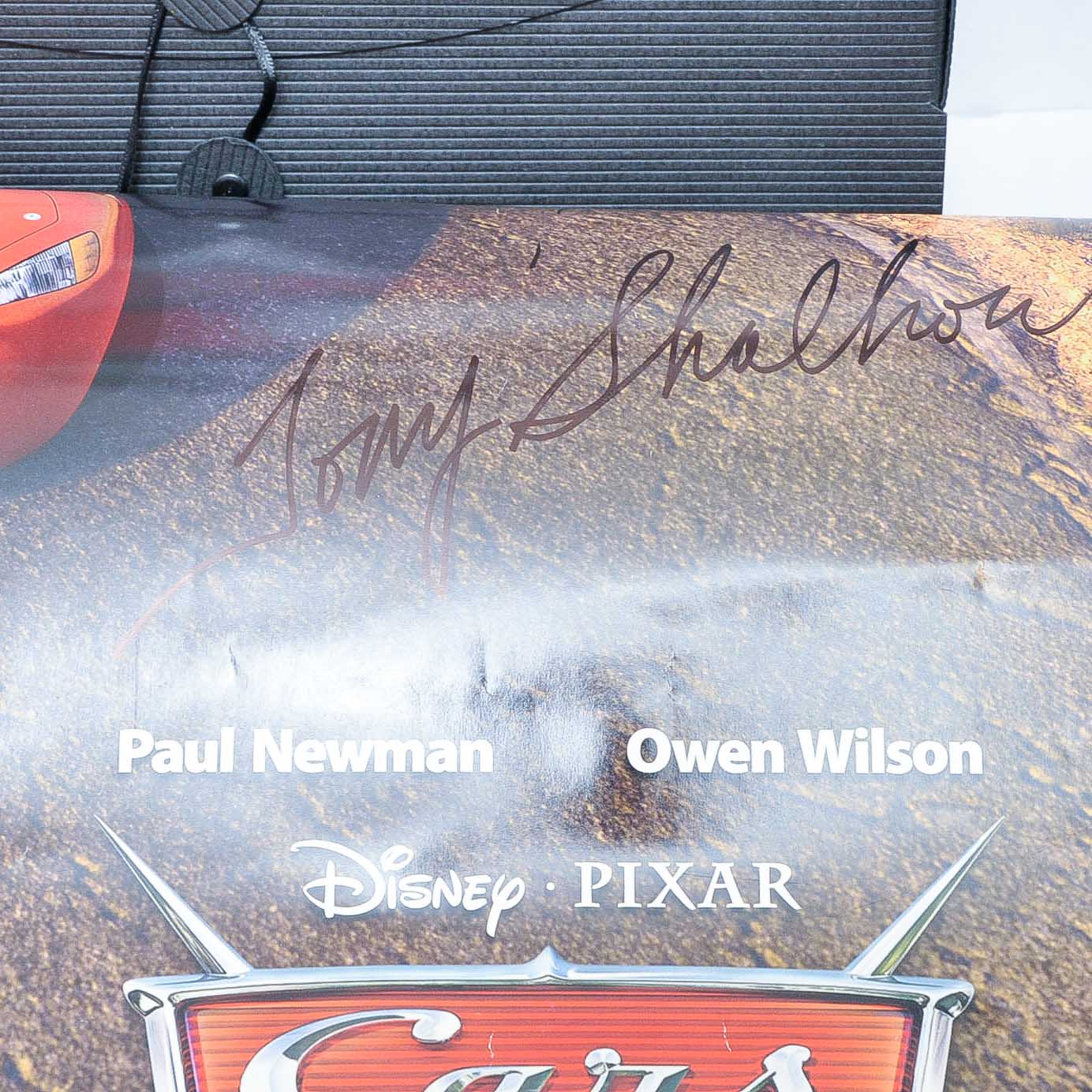 Collection of Signed "Cars" and "Cars 2" Memorabilia